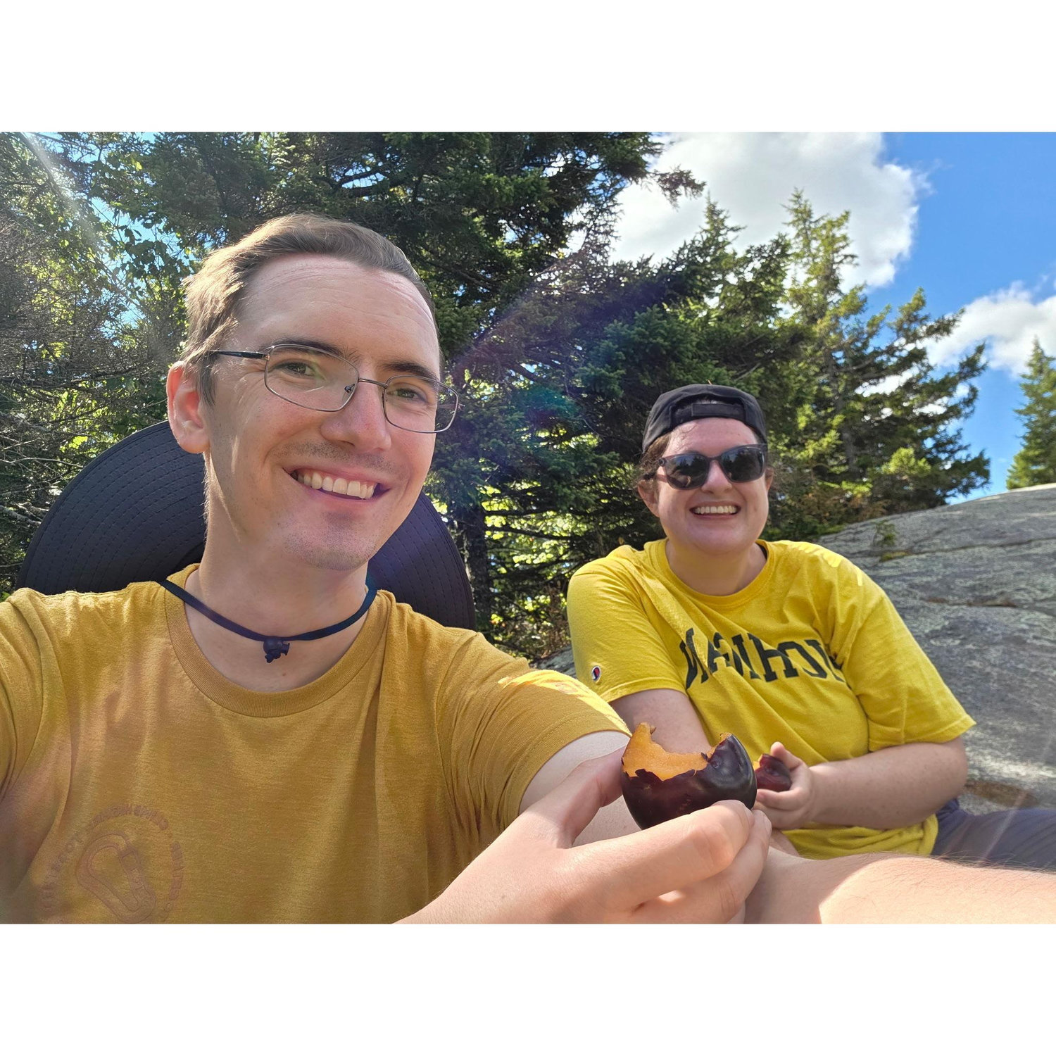 Celebratory plums after climbing Tunk Mountain together