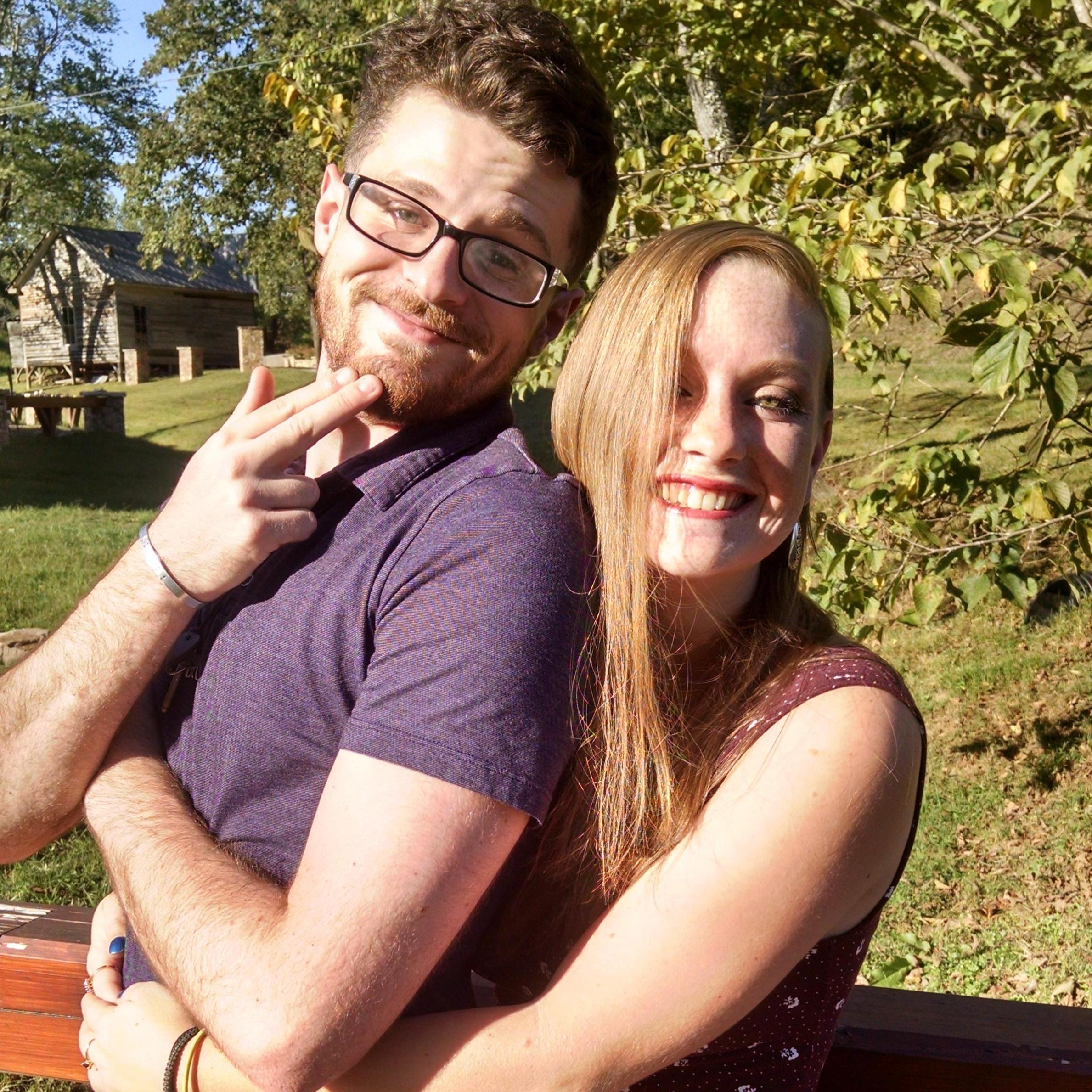 Perfecting the awkward prom pose while at a  wedding