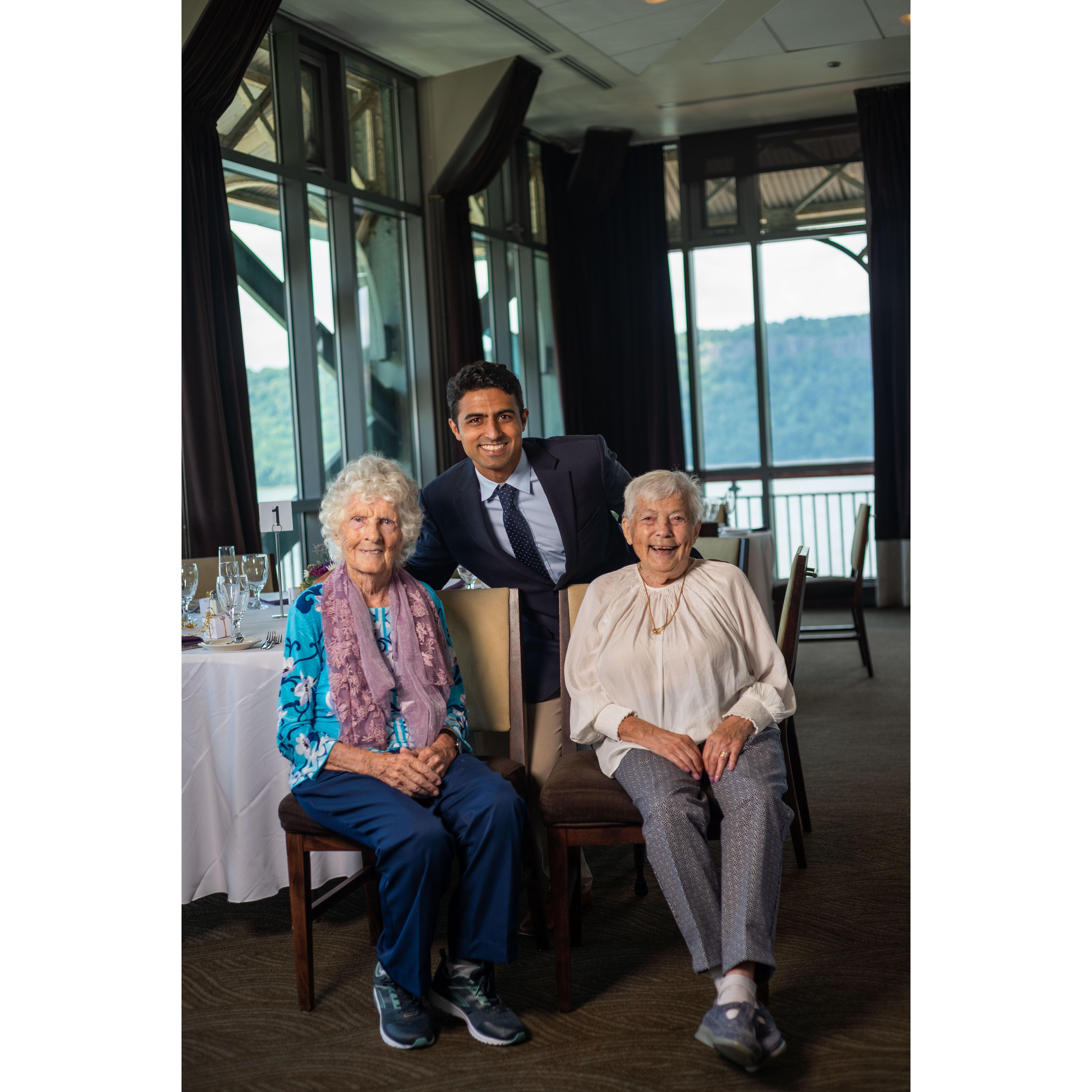 Bijan smiling with Rebecca's Grandmothers at their New York Engagement Party.