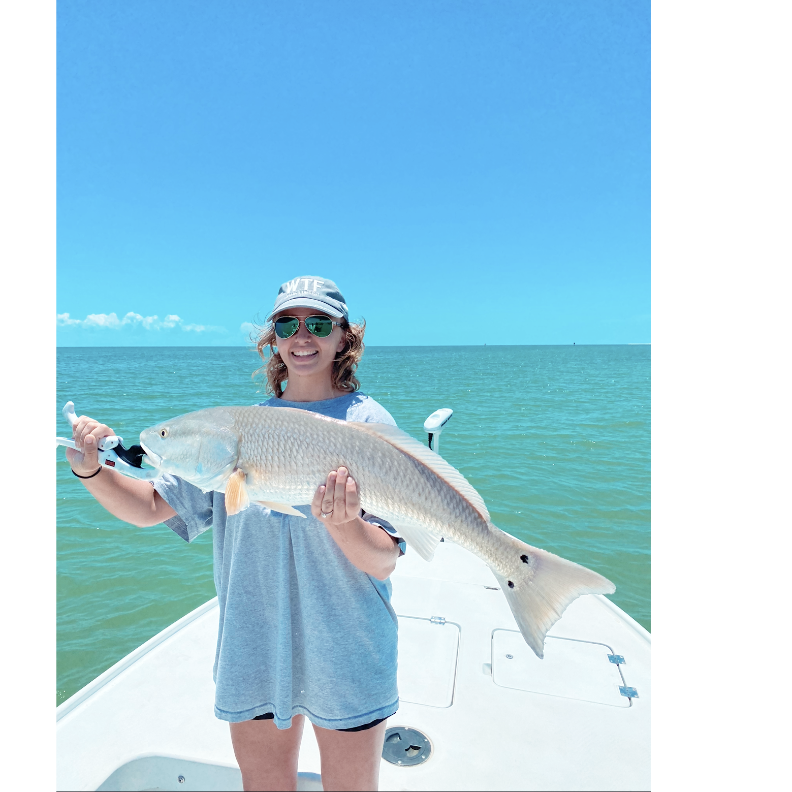 Fred and Jenna catching redfish with her family in the Ten Thousand Islands in May of 2023.