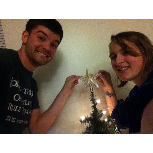 Our first Christmas together. Decorating our little tree in our dorm room at USM. December 2013.