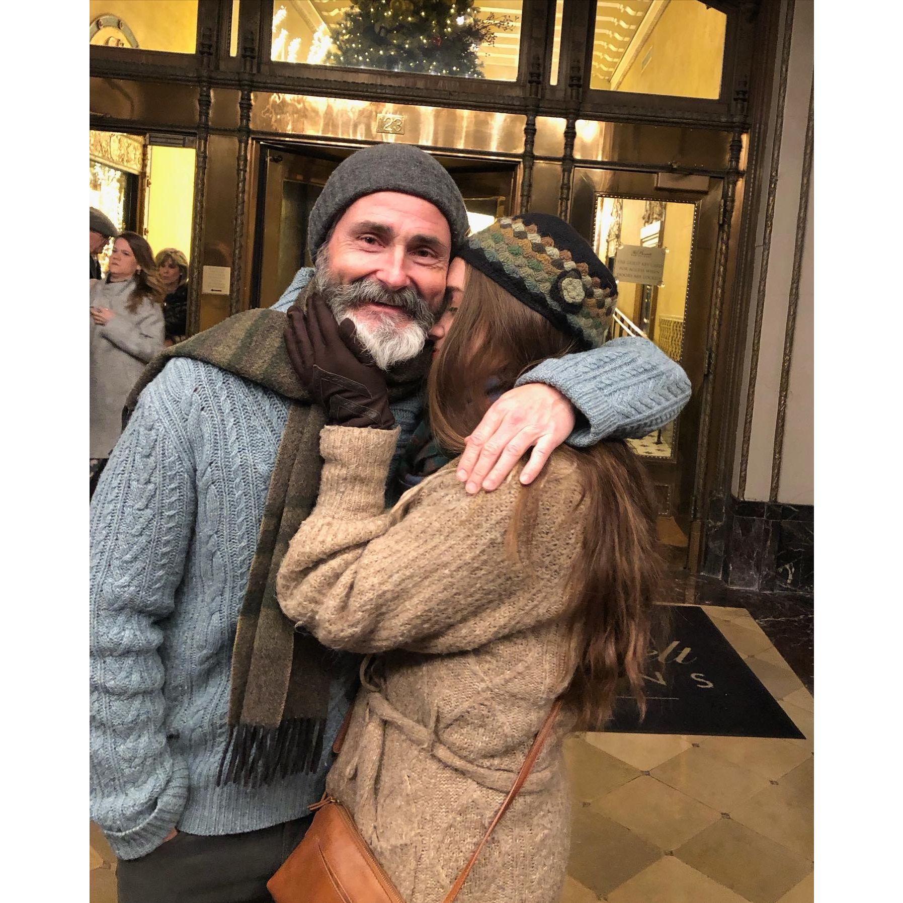 Snuggled up keeping warm in Robert's blanket of a beard during his first trip ever trip to New Orleans! Christmas of 2022.