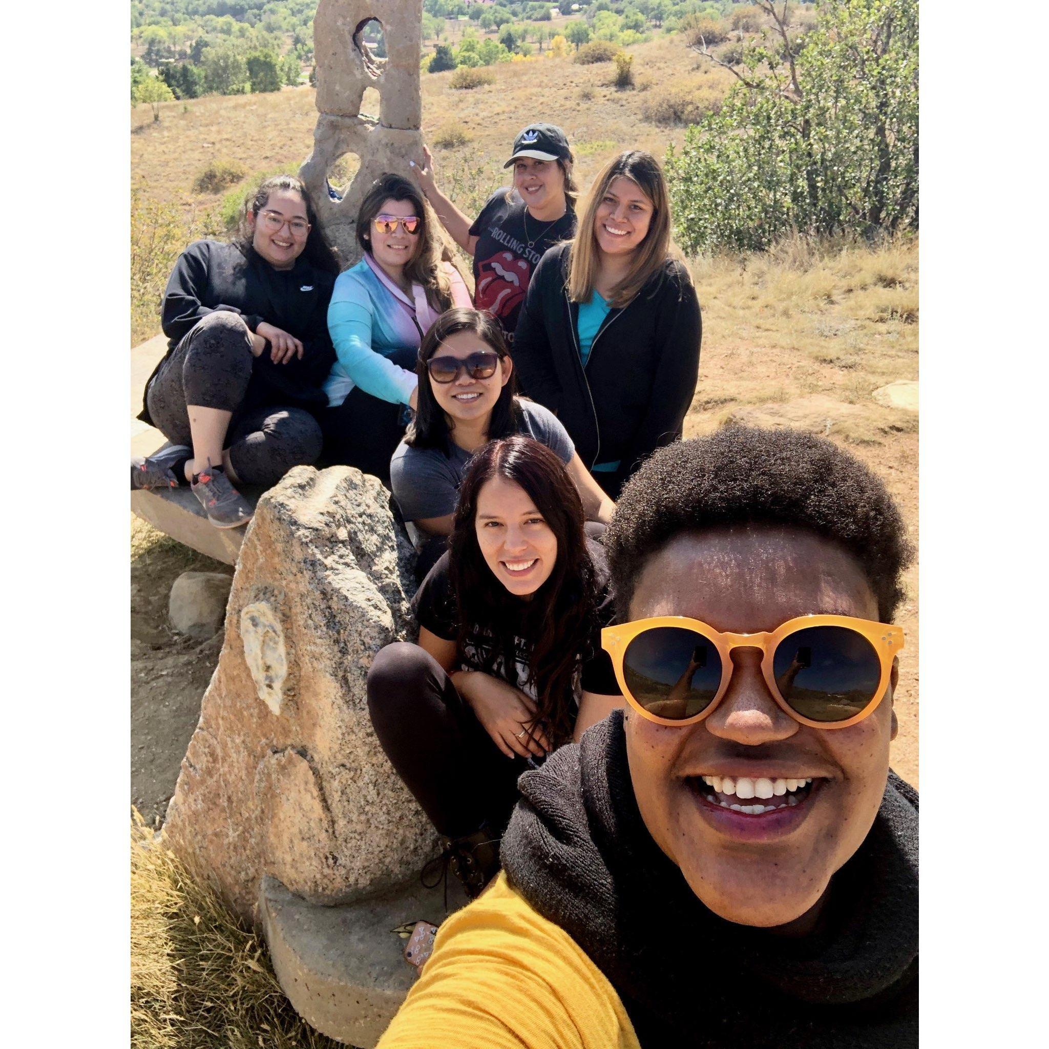 Viviana, Lorena, Andrea, Jessica, Kalia, Daisy, and Brittany after getting lost on a hike and spending over an hour looking for the lookout point. Everyone road tripped to Colorado to visit Viviana