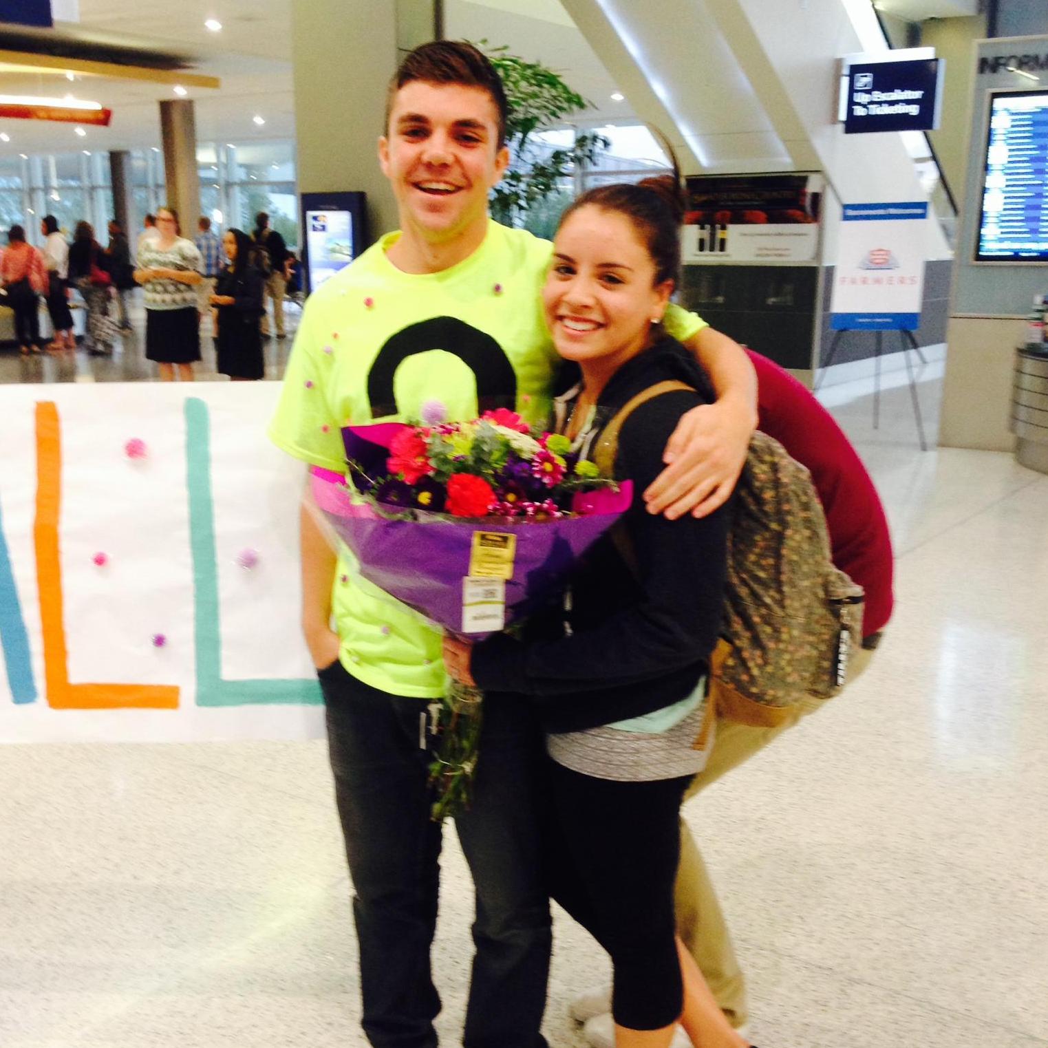 Coming home from a family trip to El Salvador, Armand asked me to his Senior Ball in the middle of the airport!