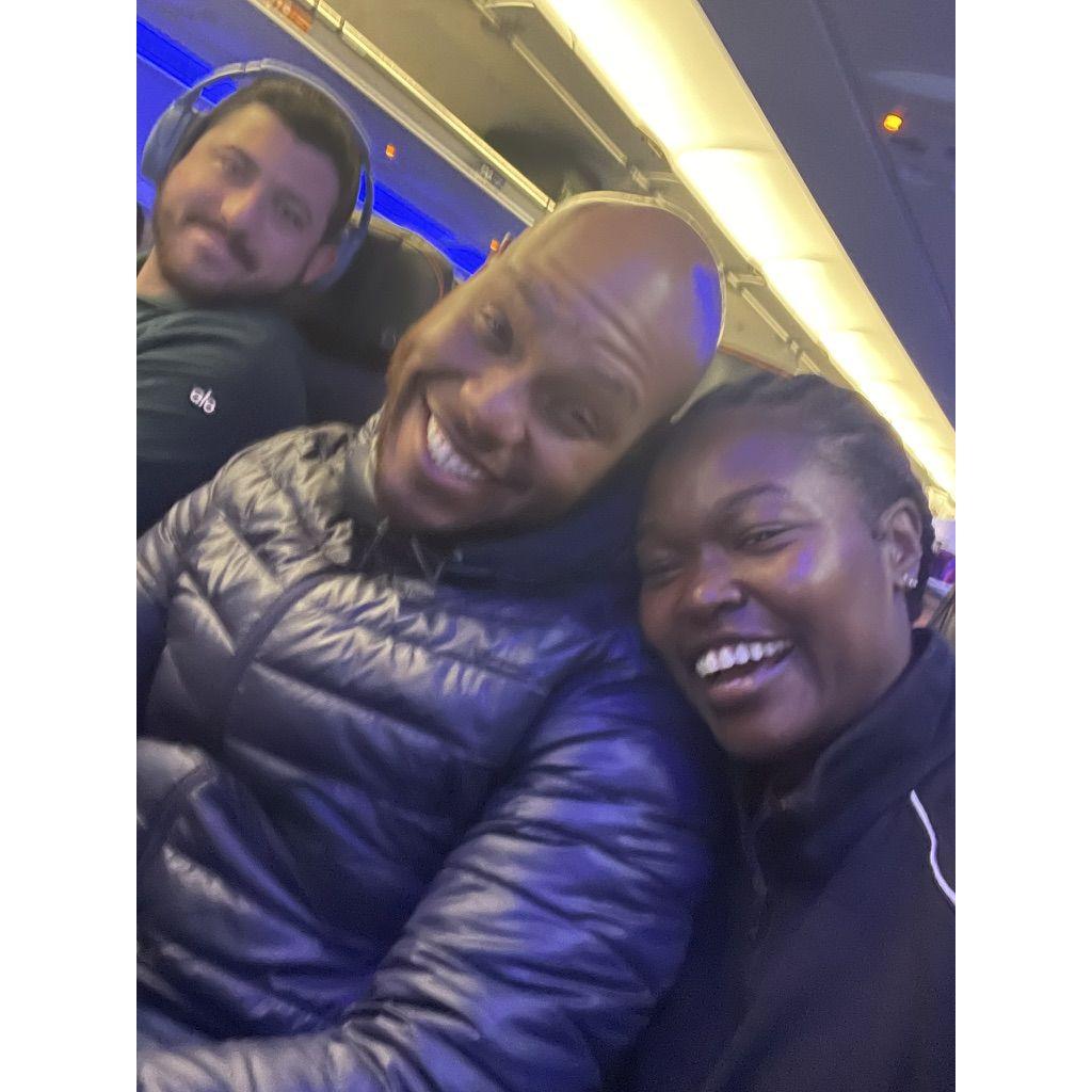 Our first flight together, don't mind the stranger photo bombing us...LOL