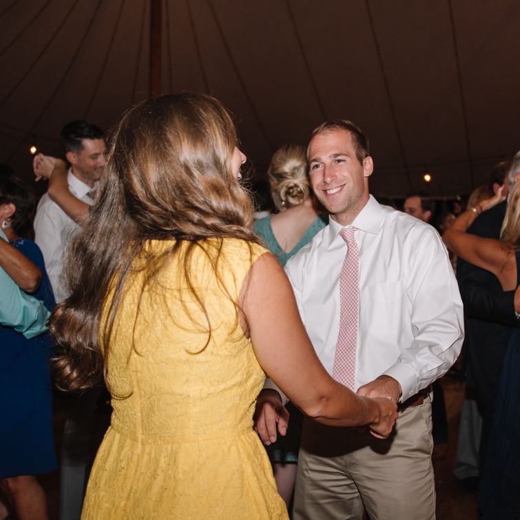 A rare photo of John dancing at a friend's wedding (Carly & Zack) in August 2018