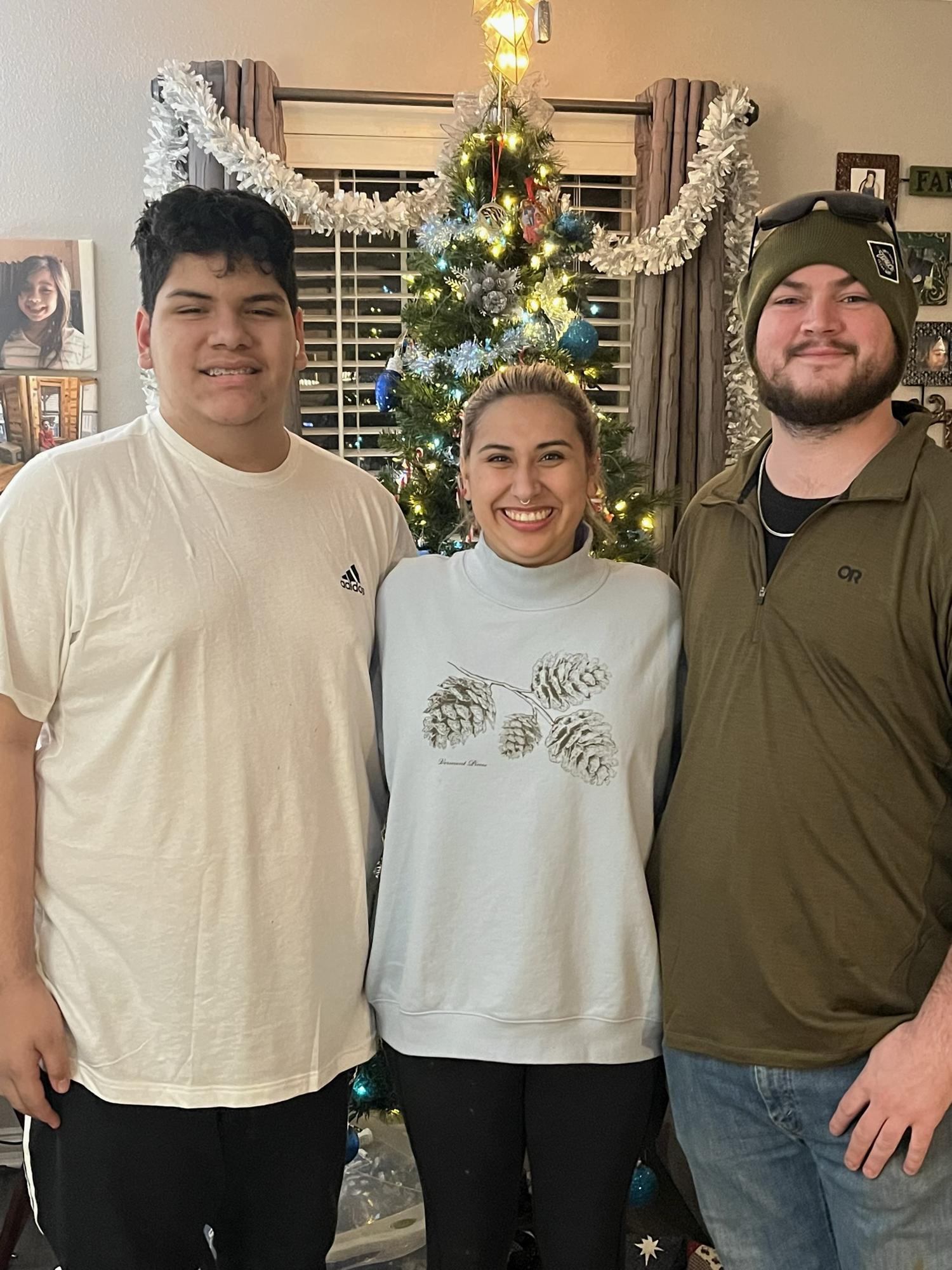 Watson (Mikaela’s brother), Mikaela, and Sam. Christmas 2022.