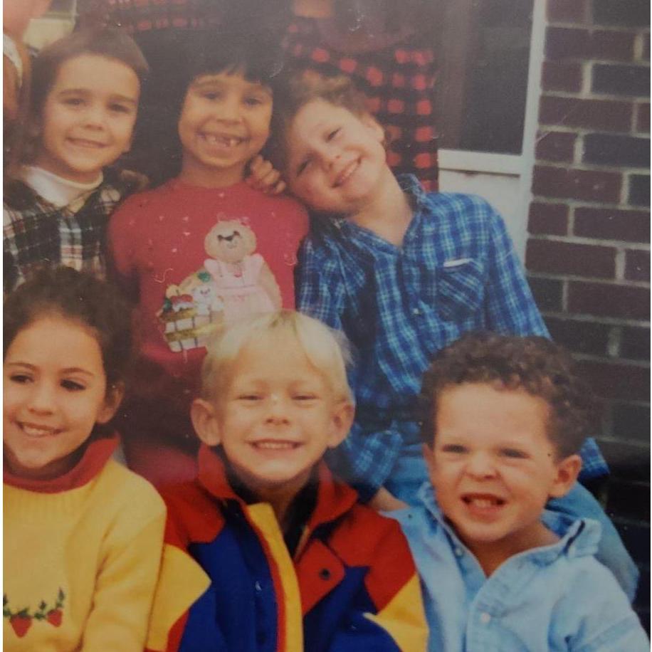 Kindergarten 1995. Elena lost a tooth on the first day of school.