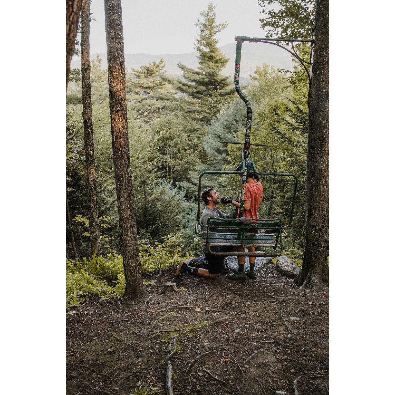 August 2022 - Cady Hill, Stowe, VT: We took a break on this repurposed chairlift while mountain biking and Matt surprised Becca with some new jewelry!