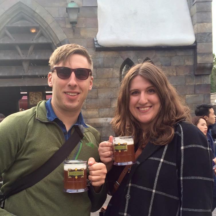 Enjoying a Butterbeer at Harry Potter World!