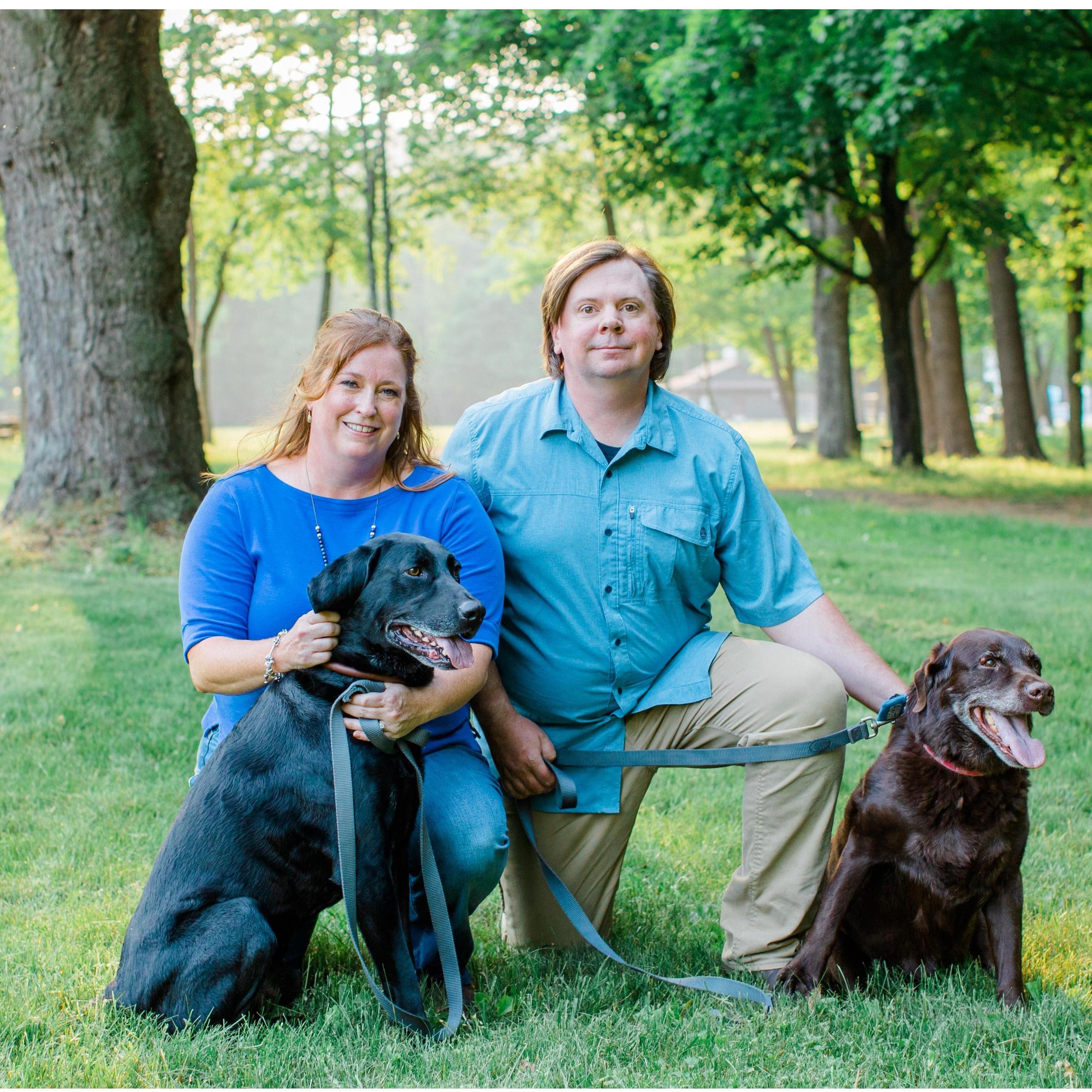 Family picture; the fur babies: Dakota (the older chocolate lab) and Jackson (Black lab mix)