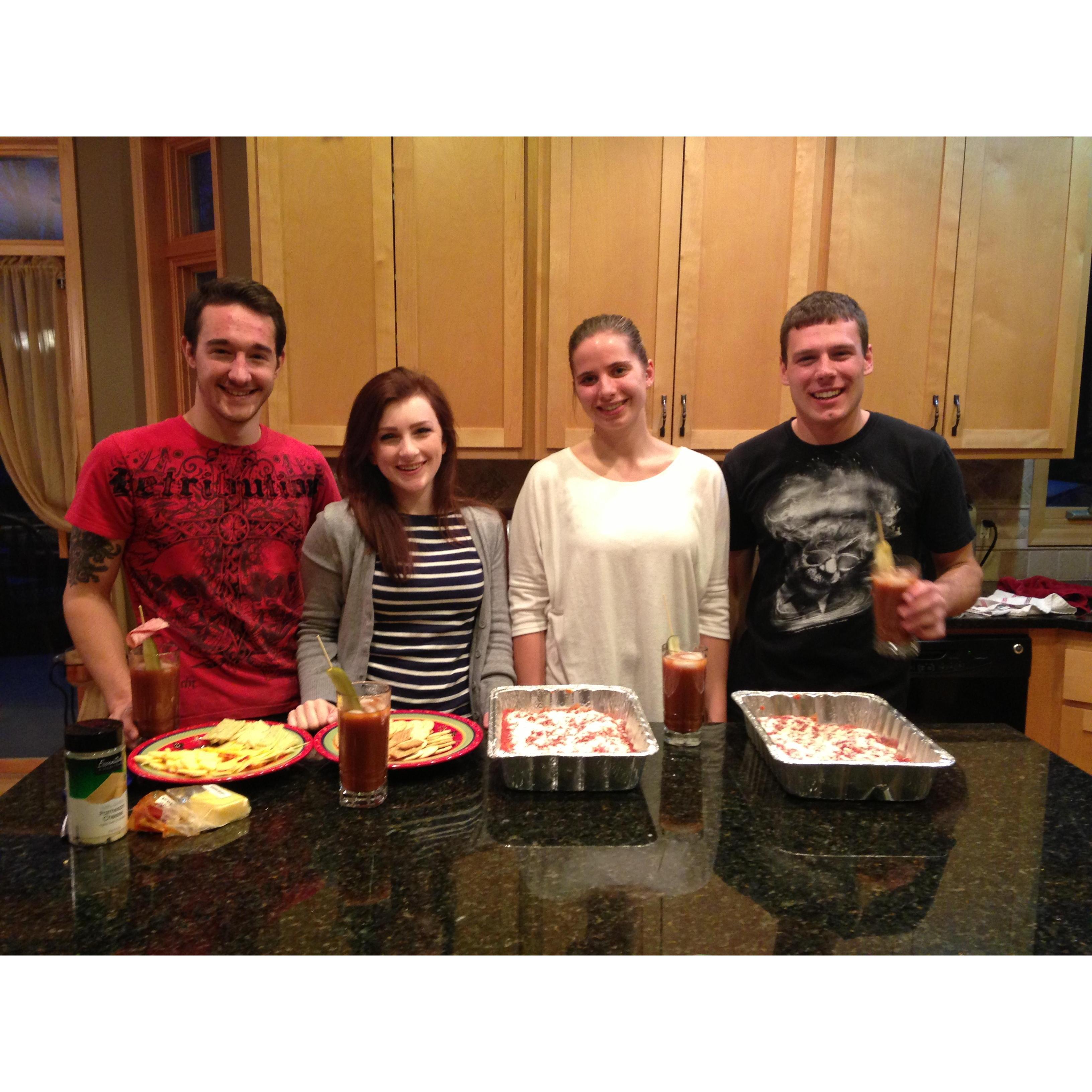 Two of our very best friends, Christina and John, helping us make our very favorite thing... food!