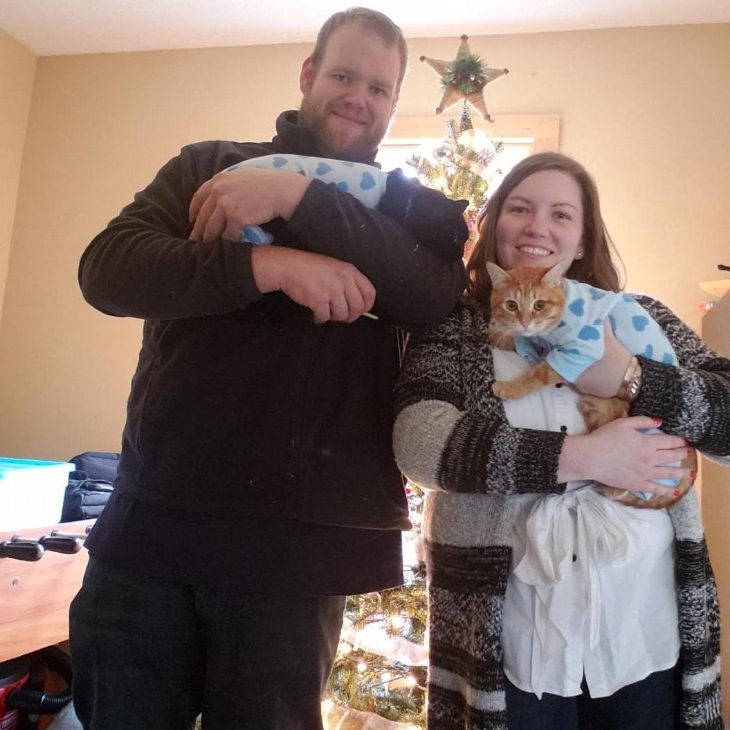 Our first Christmas together, 2018. Herb and Asher wearing their Christmas jammies from Scott's mom.
