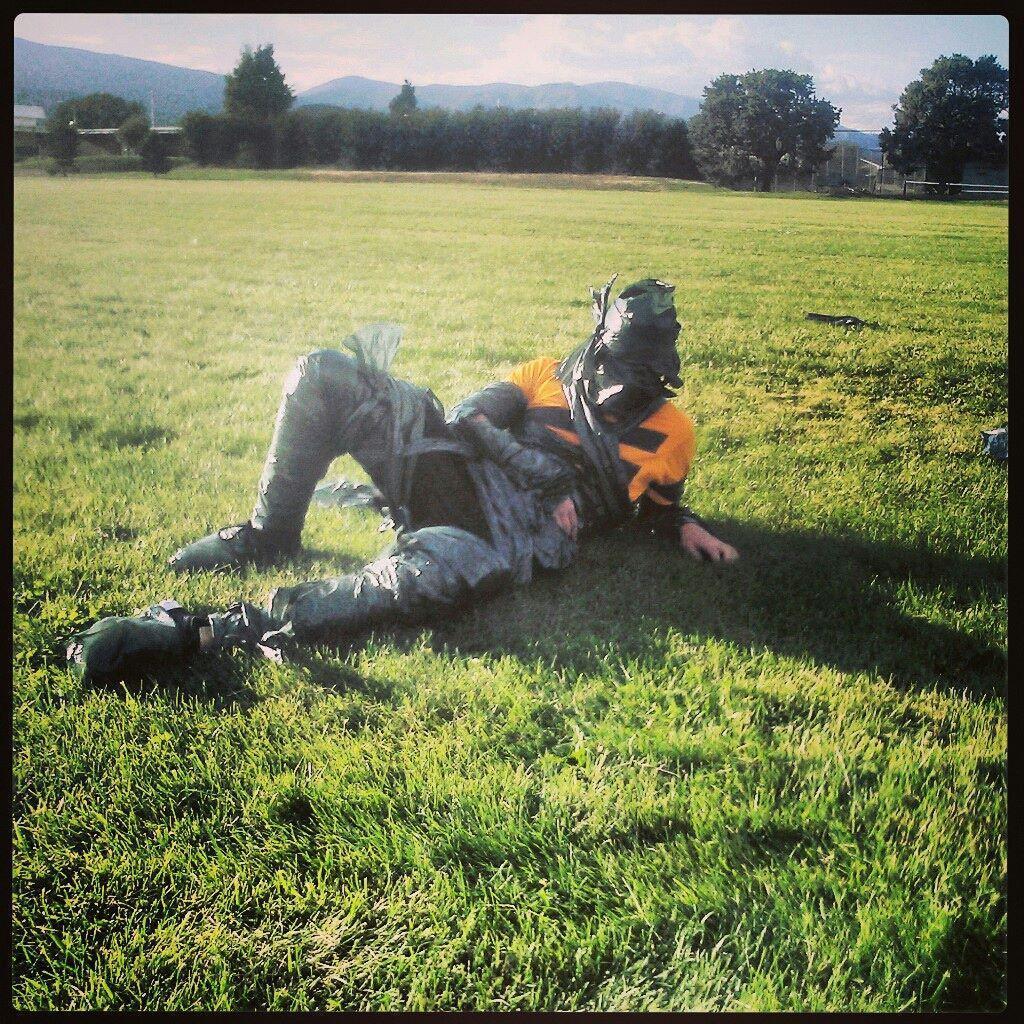 Evan trying to get my attention dressing up as a ninja with the park's dogpoop bags (yr2010)