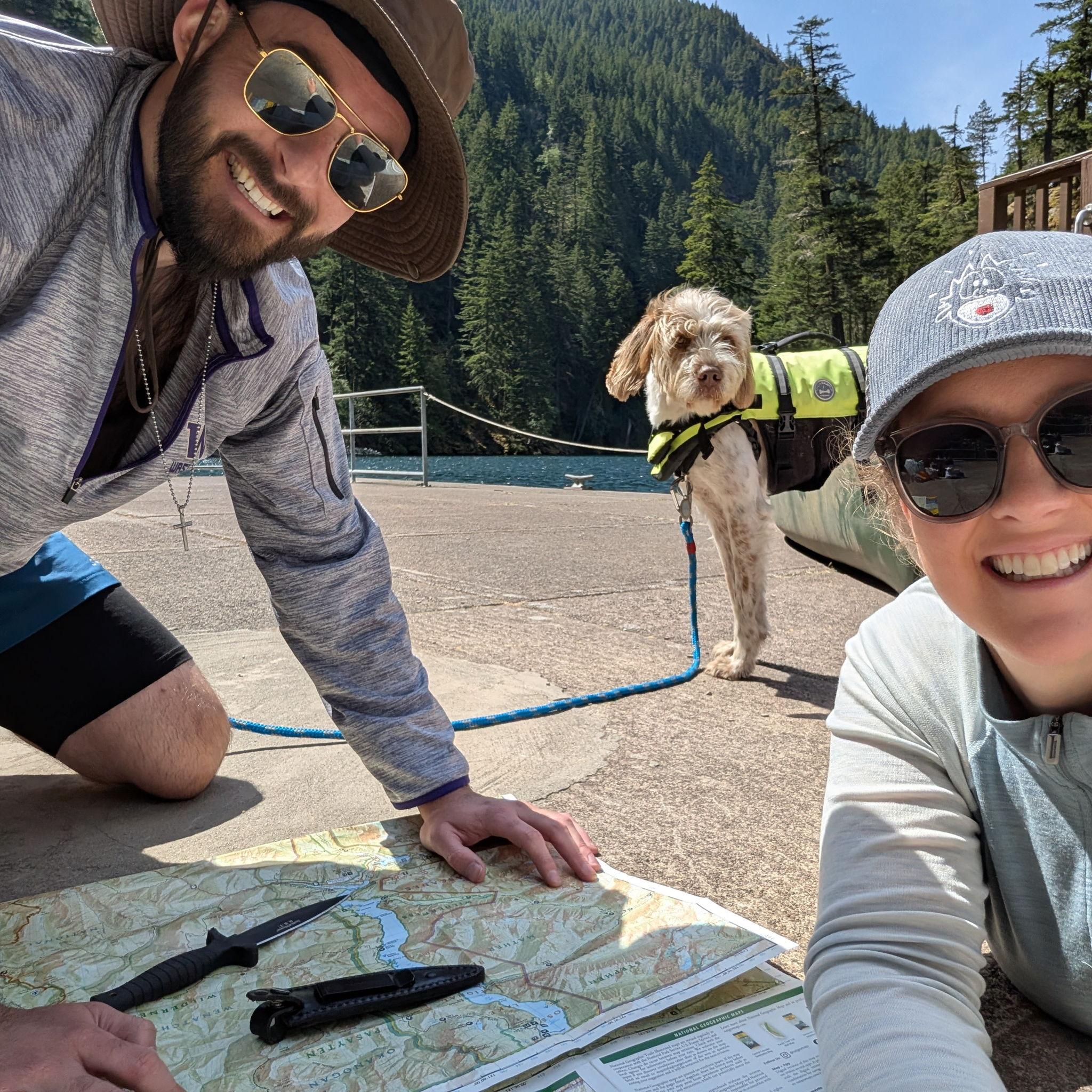 Our navigator plotting our route at Ross Lake.