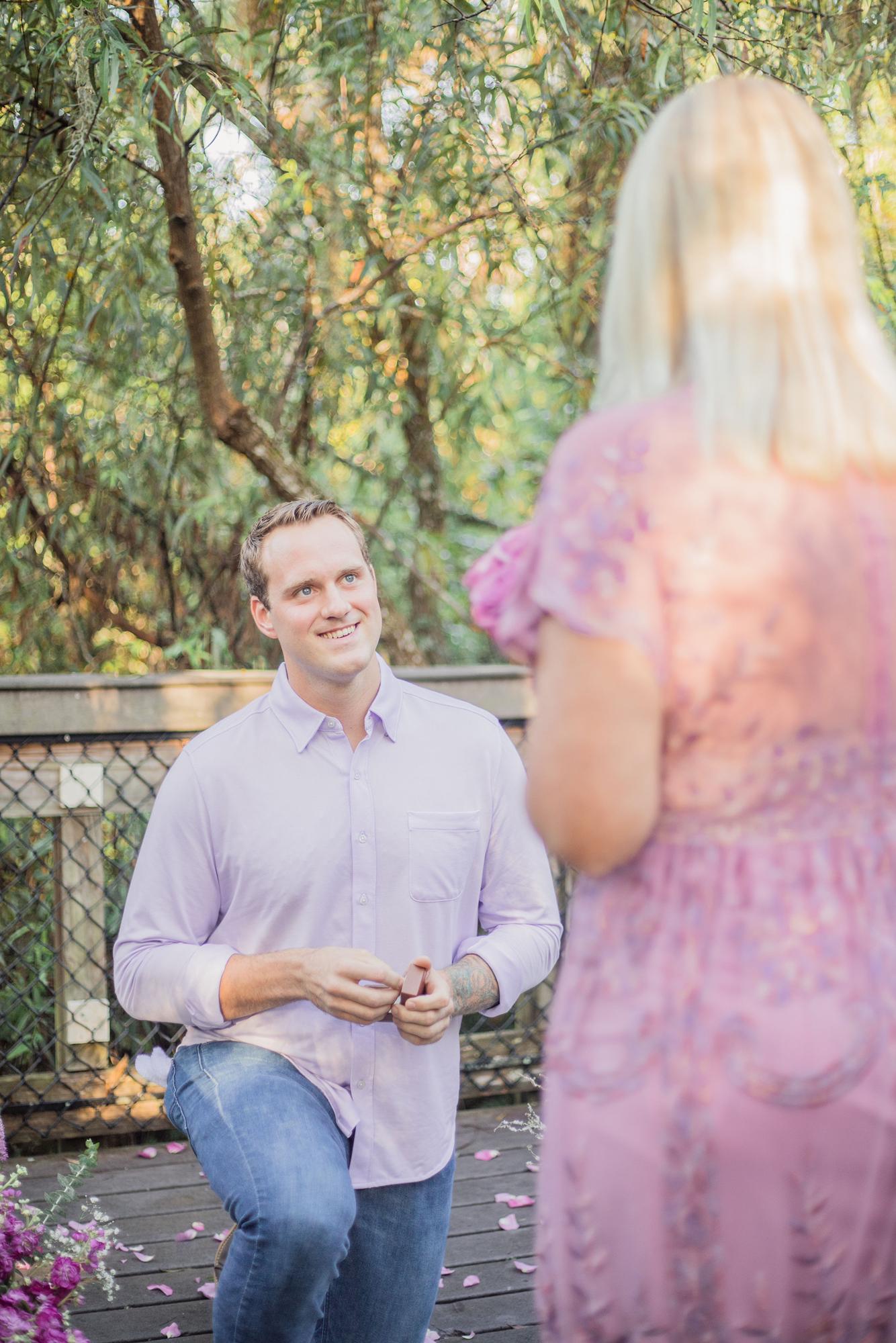 Once she reached the end of the pier, CONNOR GOT DOWN ON ONE KNEE and asked Justine to marry him!
