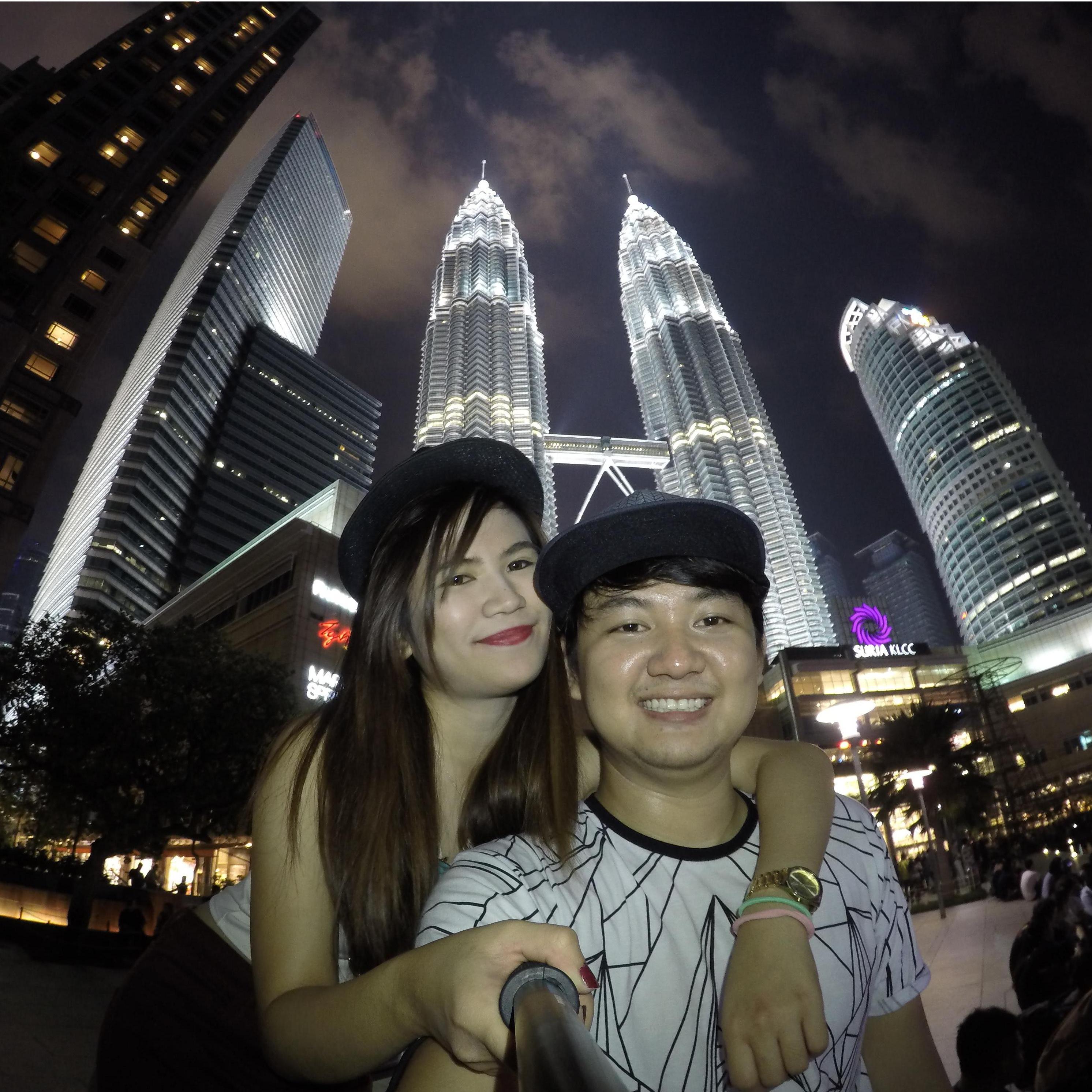 Our first international trip together! This was taken in front of the Petronas Towers in Kuala Lumpur, Malaysia.