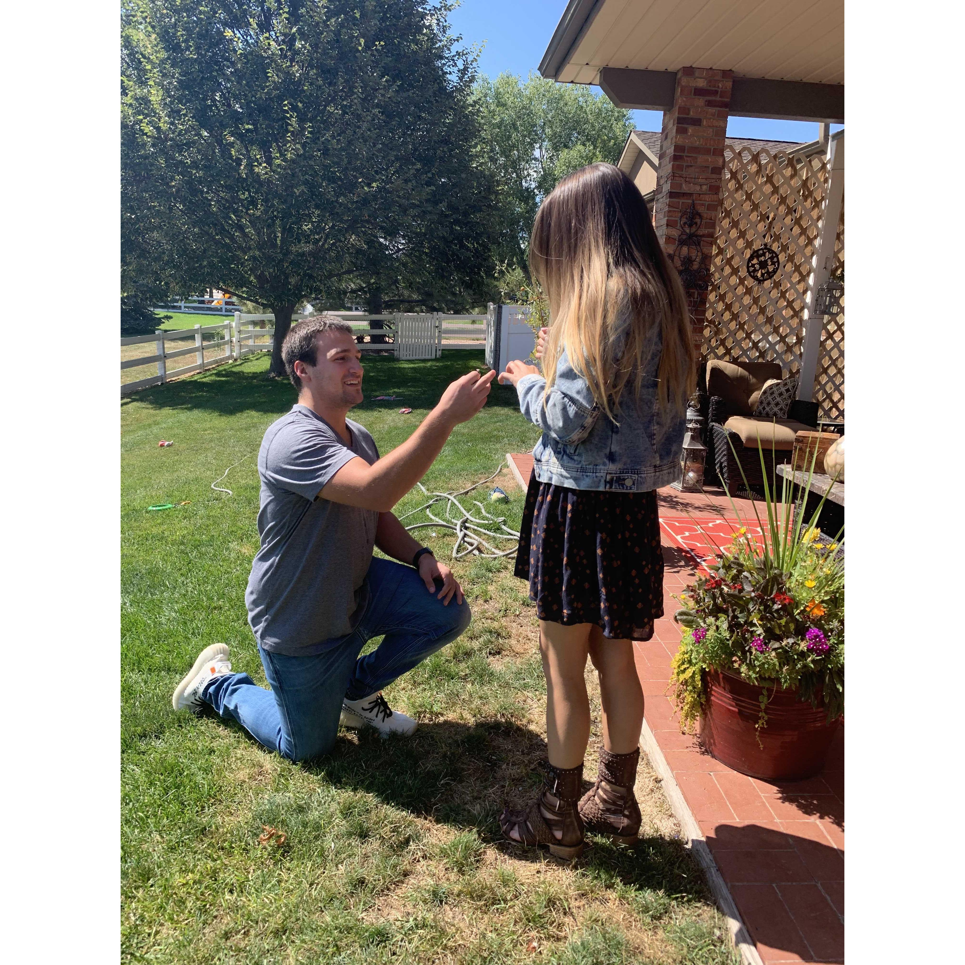 Kyle popped the question, in his families back yard at a Labor Day cookout. Broomfield, Colorado 09.01.2019 <3