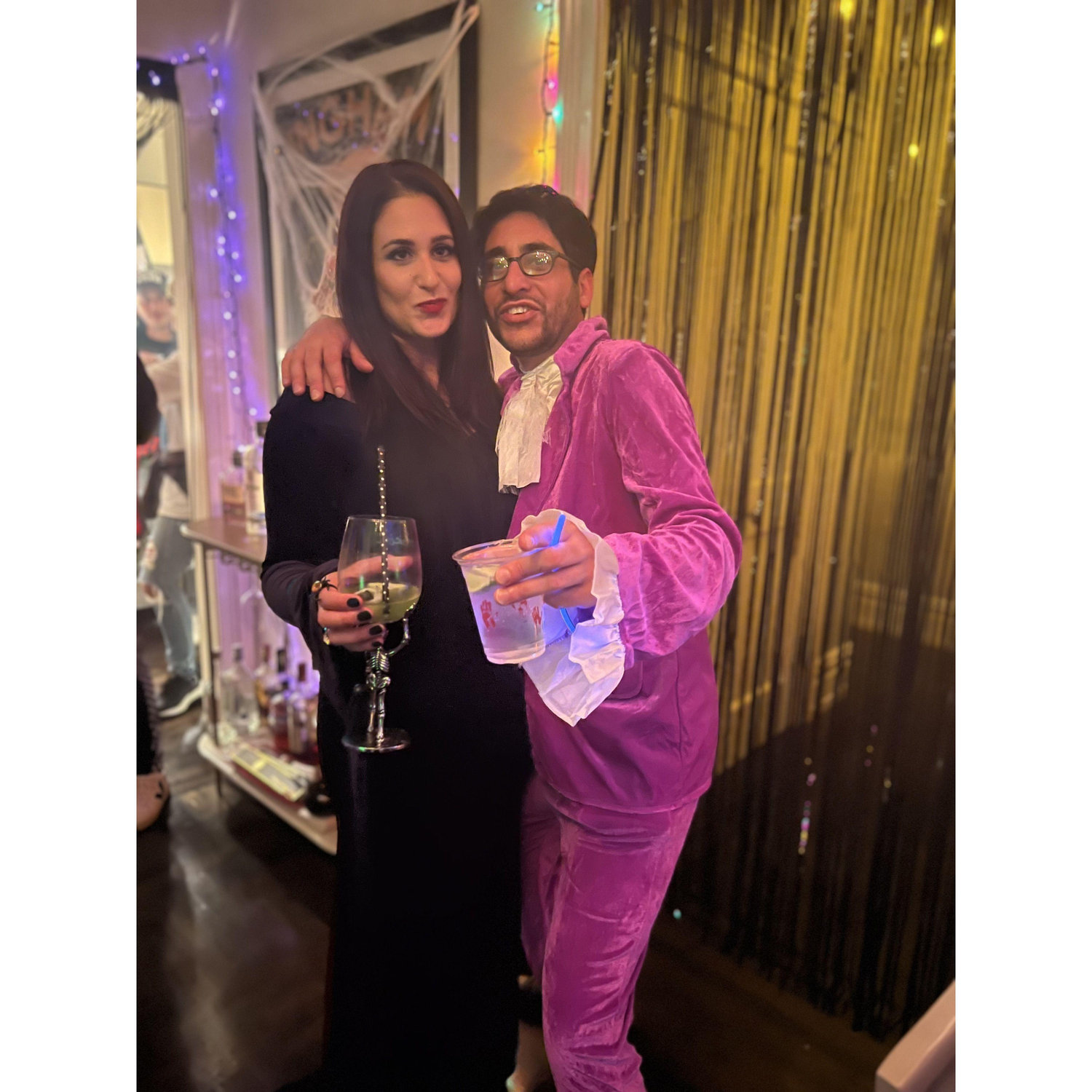Morticia and Austin Powers host their first Halloween party together <3