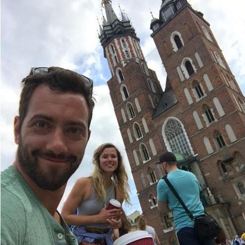 Us. Bell Tower in Krakow and Some Dude in a Turquoise Shirt.