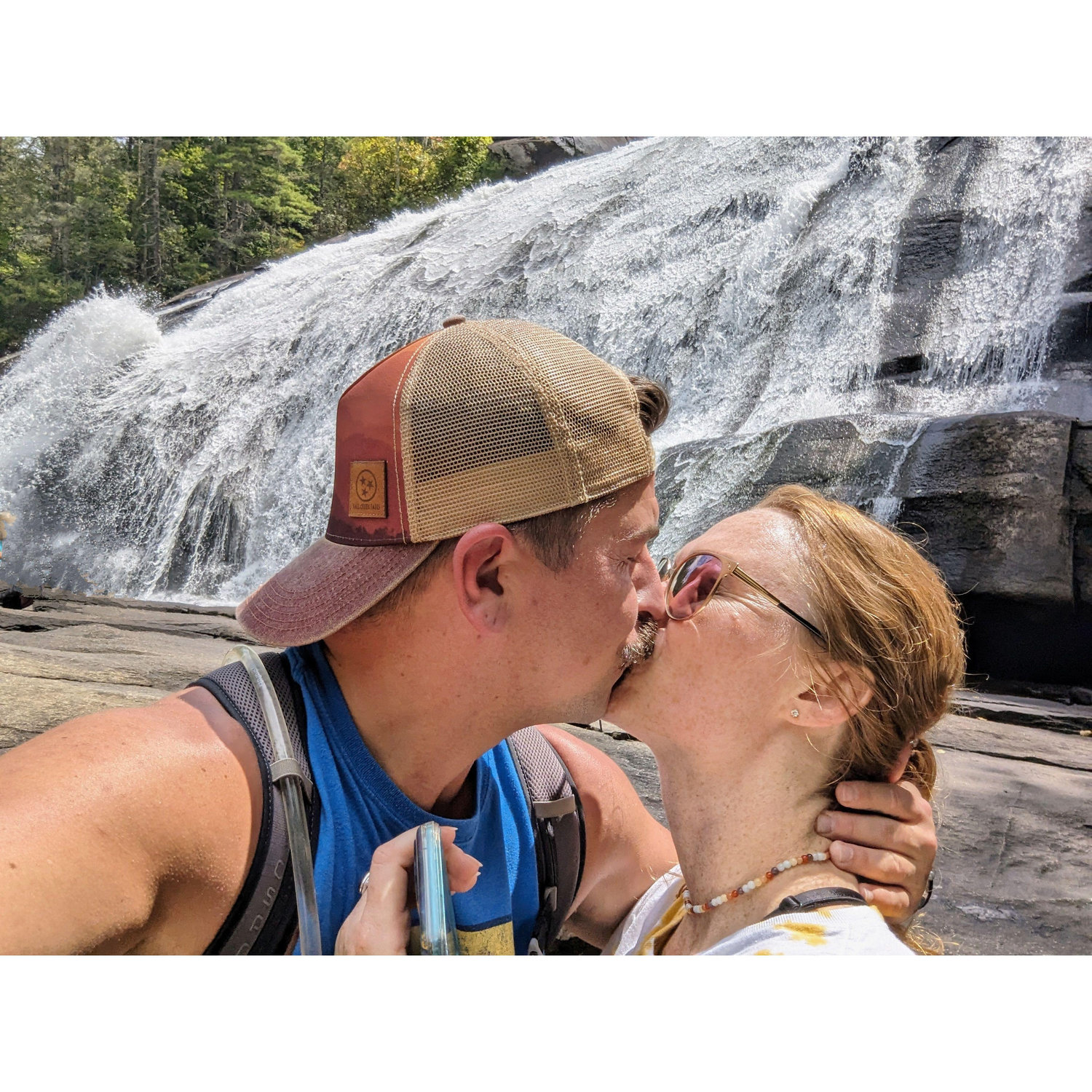 The first kiss at a waterfall. High Falls, NC