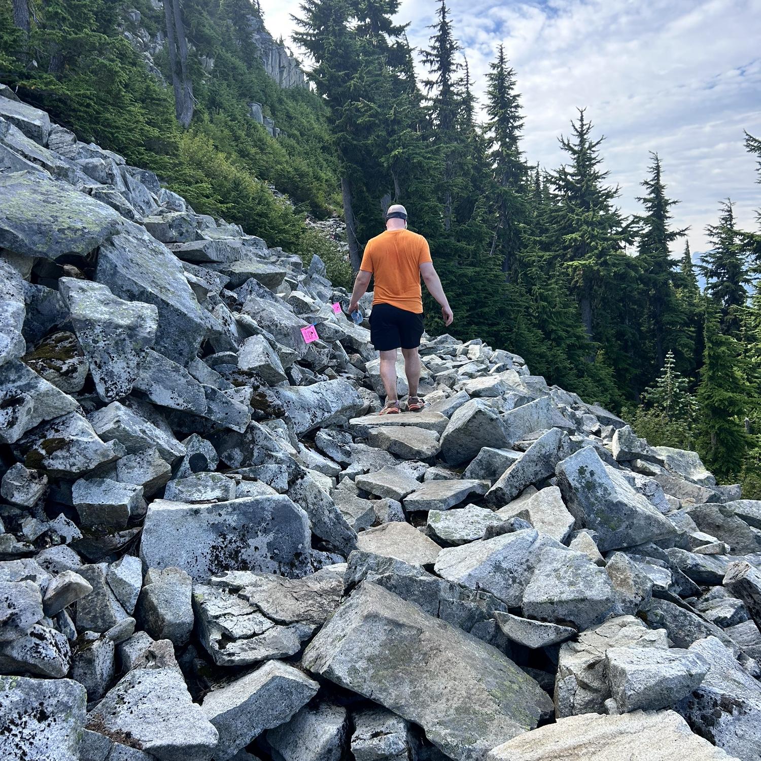 Brycen doing a trail run on Mount Washington on Vancouver Island.