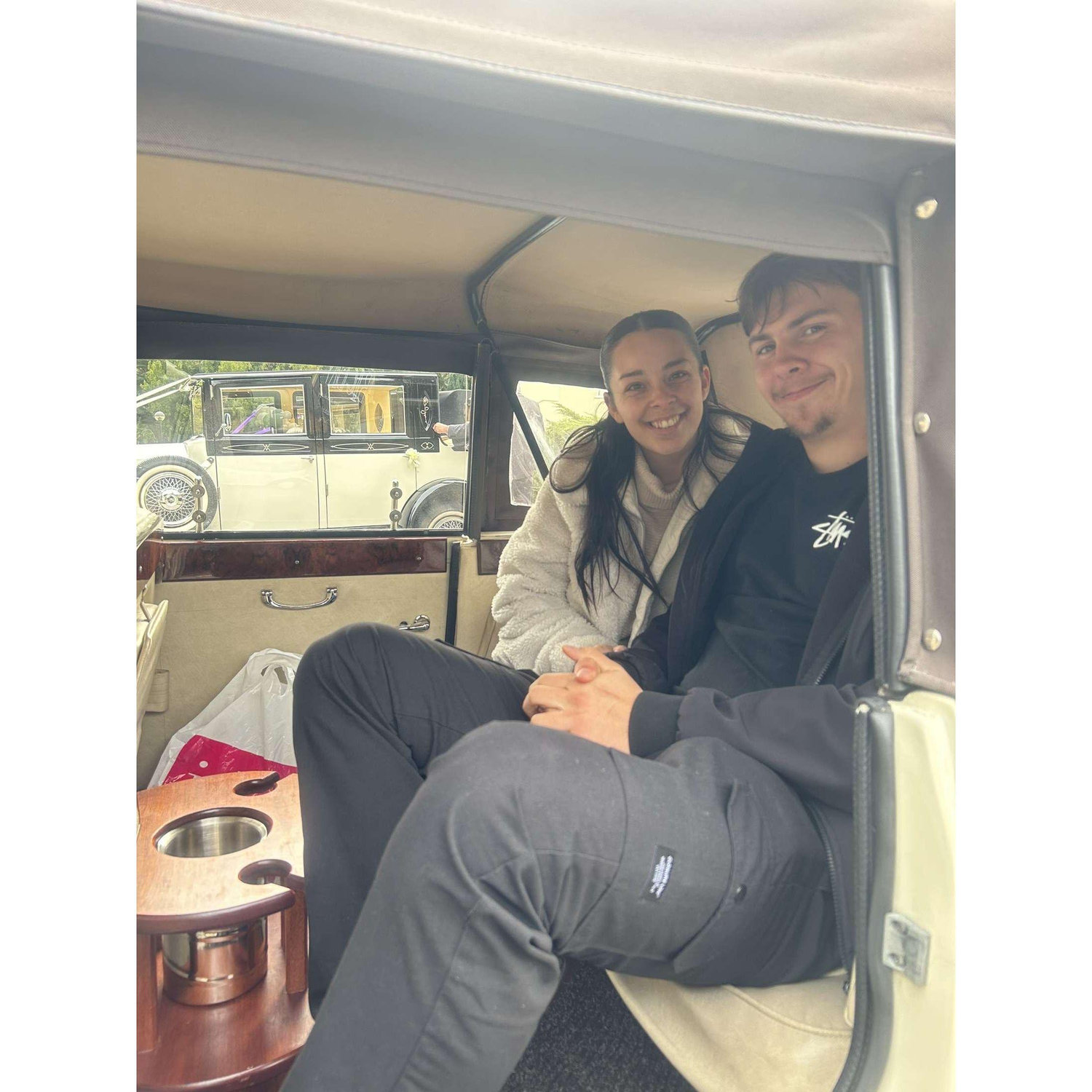 Us at a wedding showcase when we found our wedding car