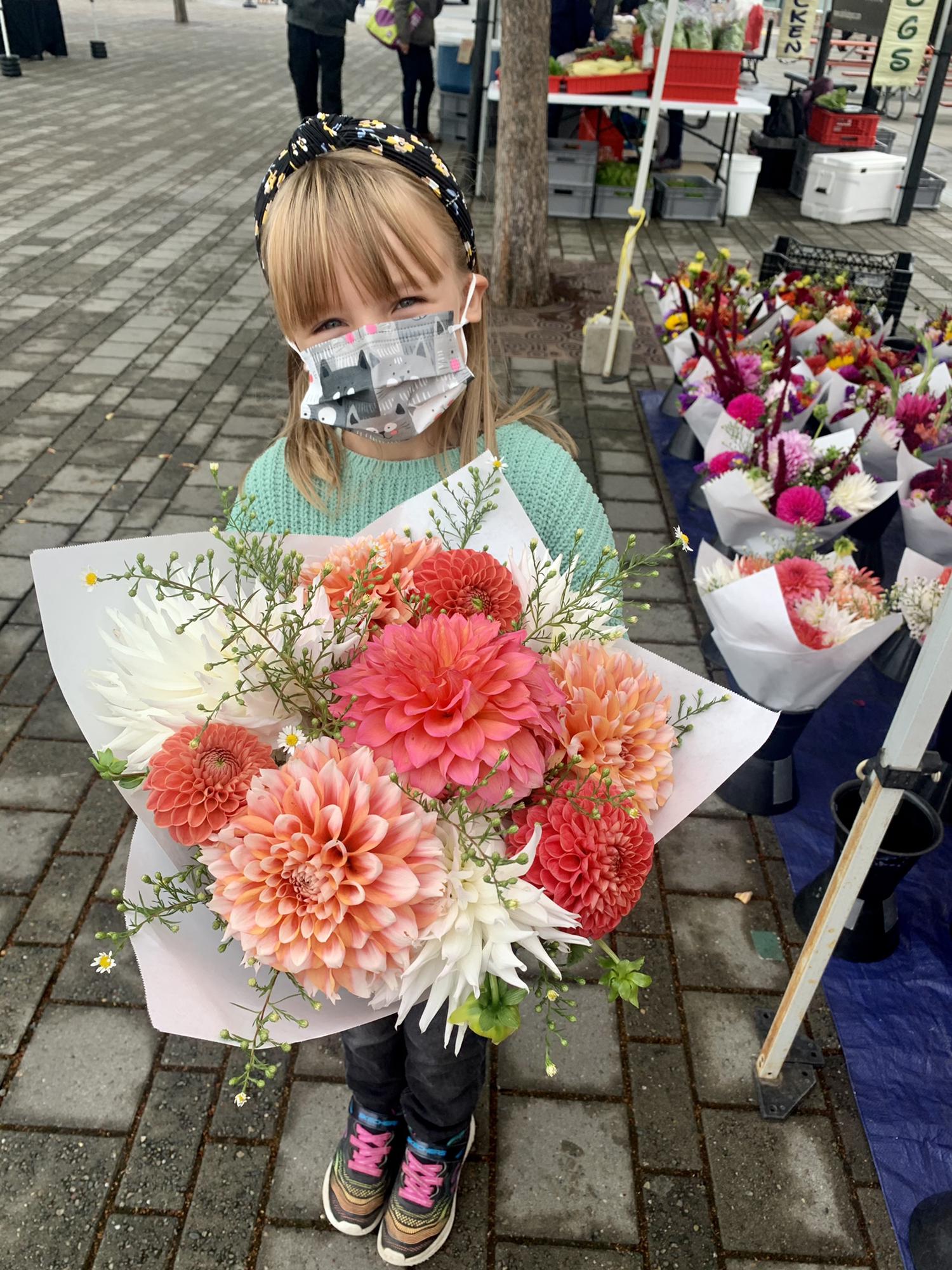 Picking out the flowers at the Farmer’s Market!
