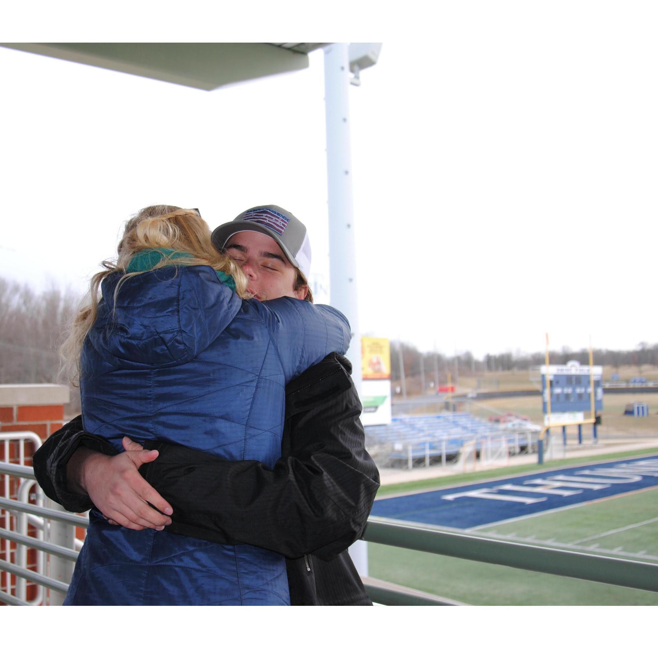 Big hugs after a couple months apart after a Lacrosse game