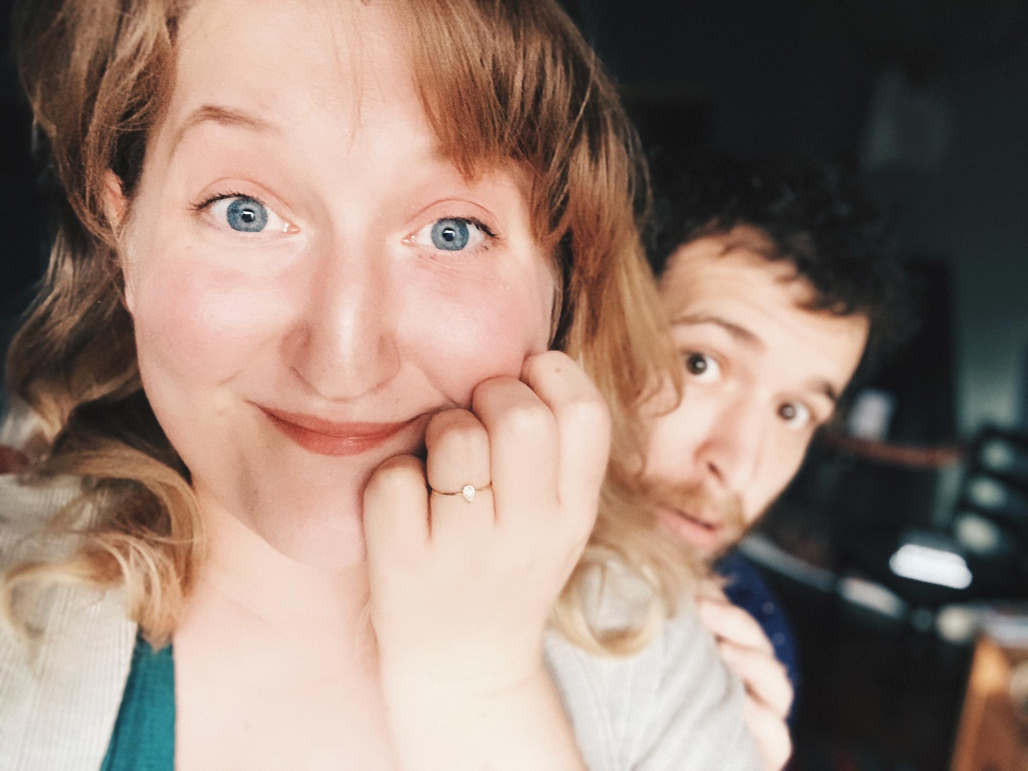The first photo after he asked!