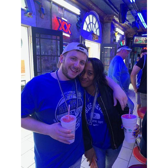April 2022. New Orleans, LA. Attending the Men's NCAA Final Four together. Duke tragically lost, Dustin attempted to console Tia once again.
