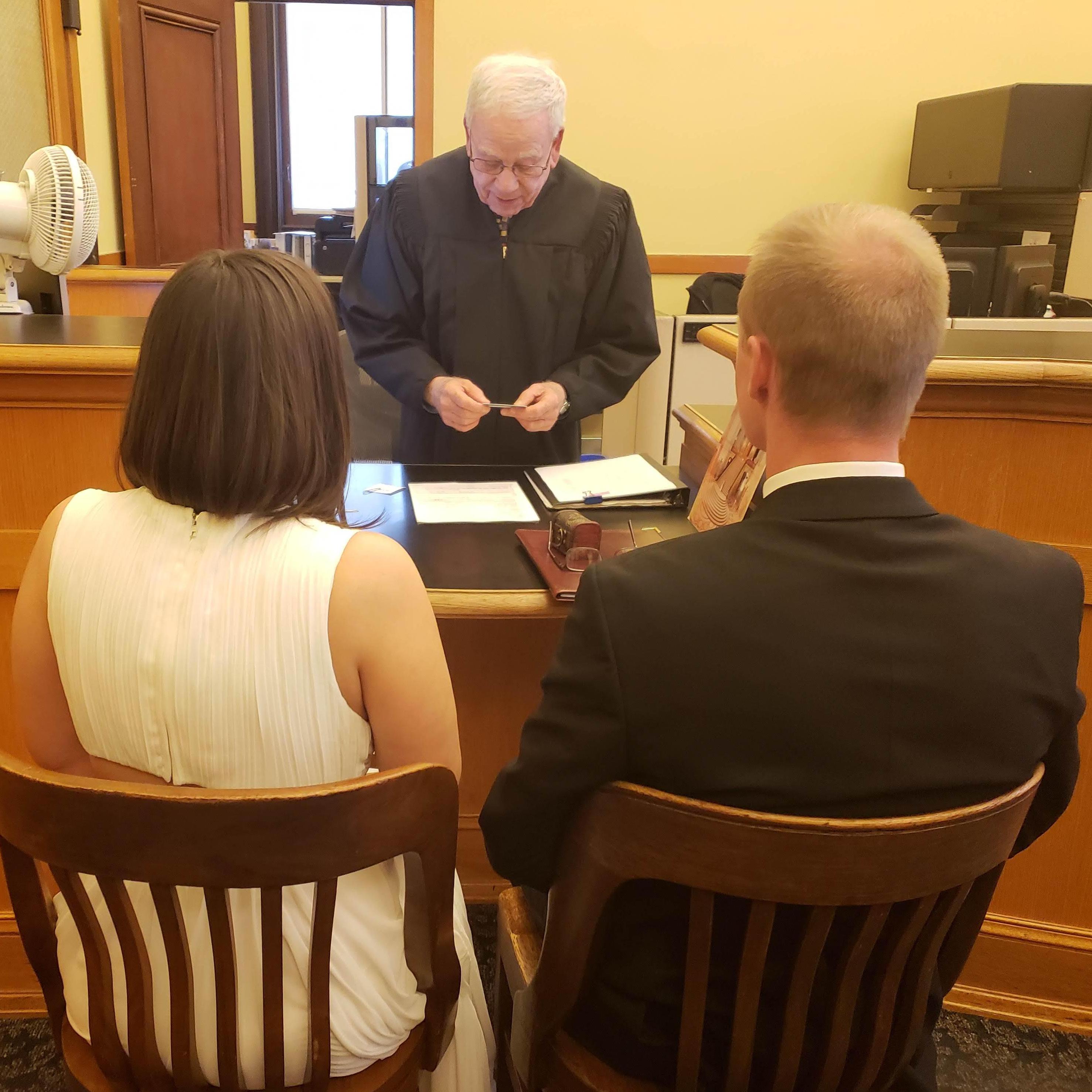 Our officiant Thomas going over the fine print with us