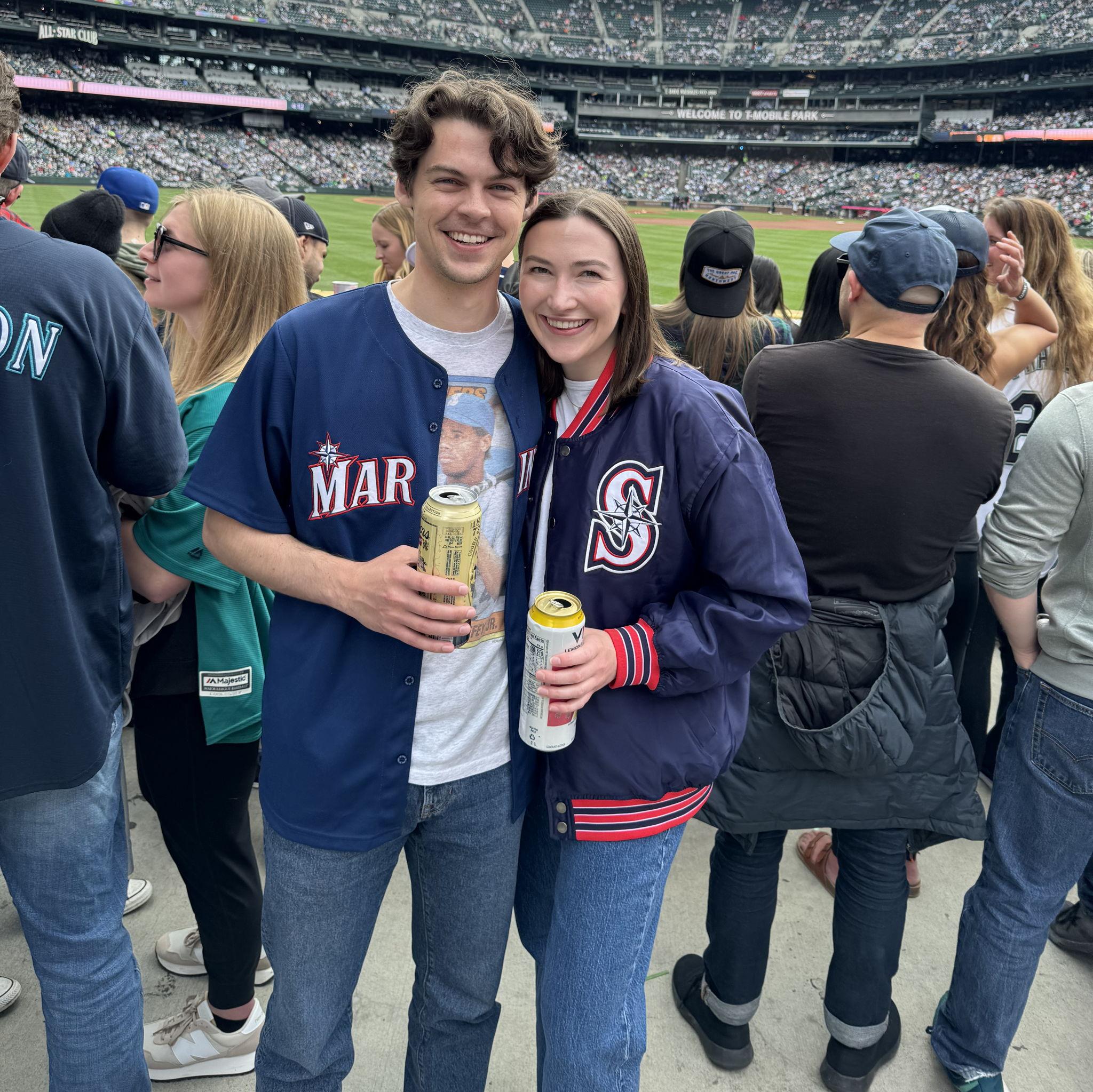 June 2024. Not only are we smiling at the Mariners win, but this was taken the day that we moved in with each other!