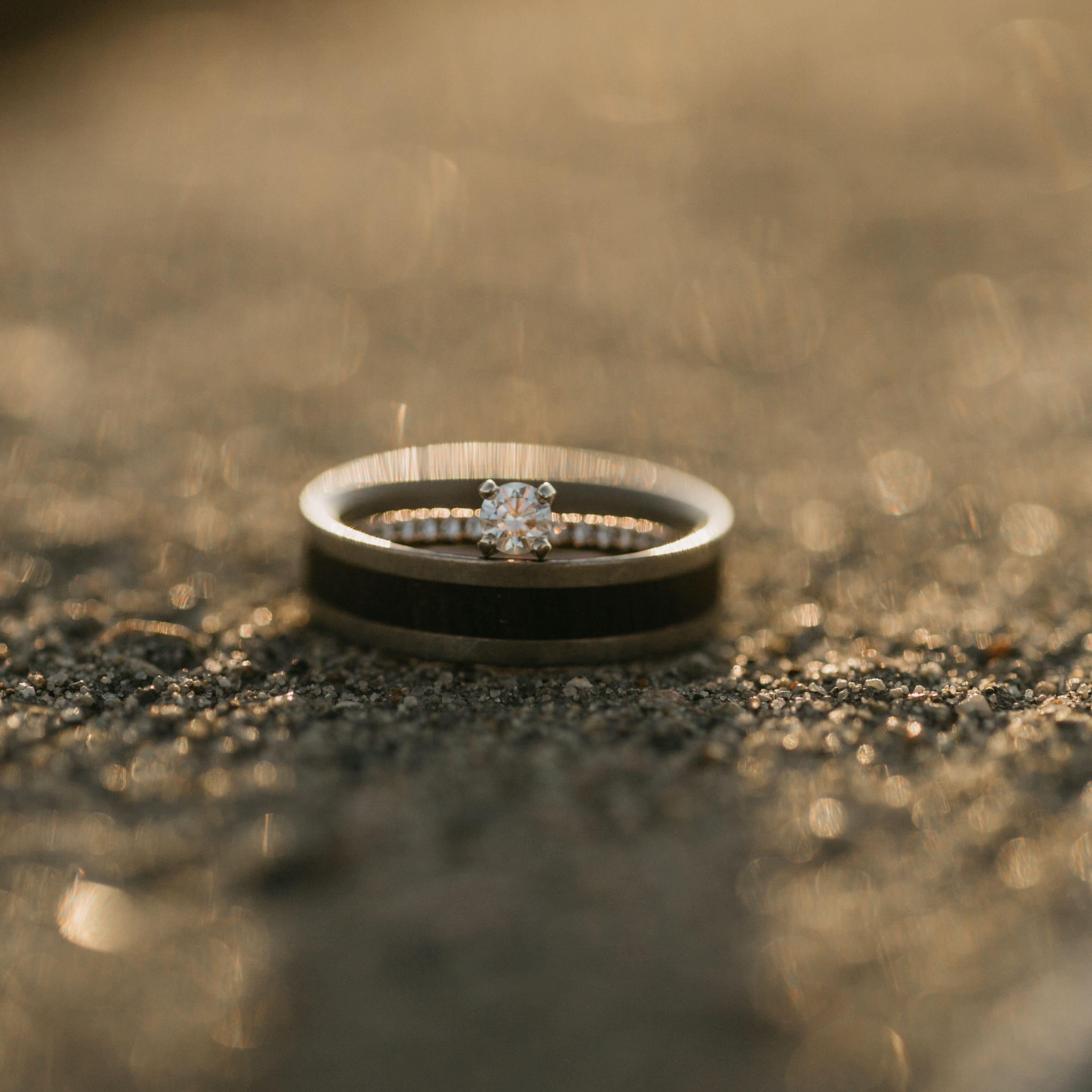 Yeup... June's ring fits inside of Mitchell's