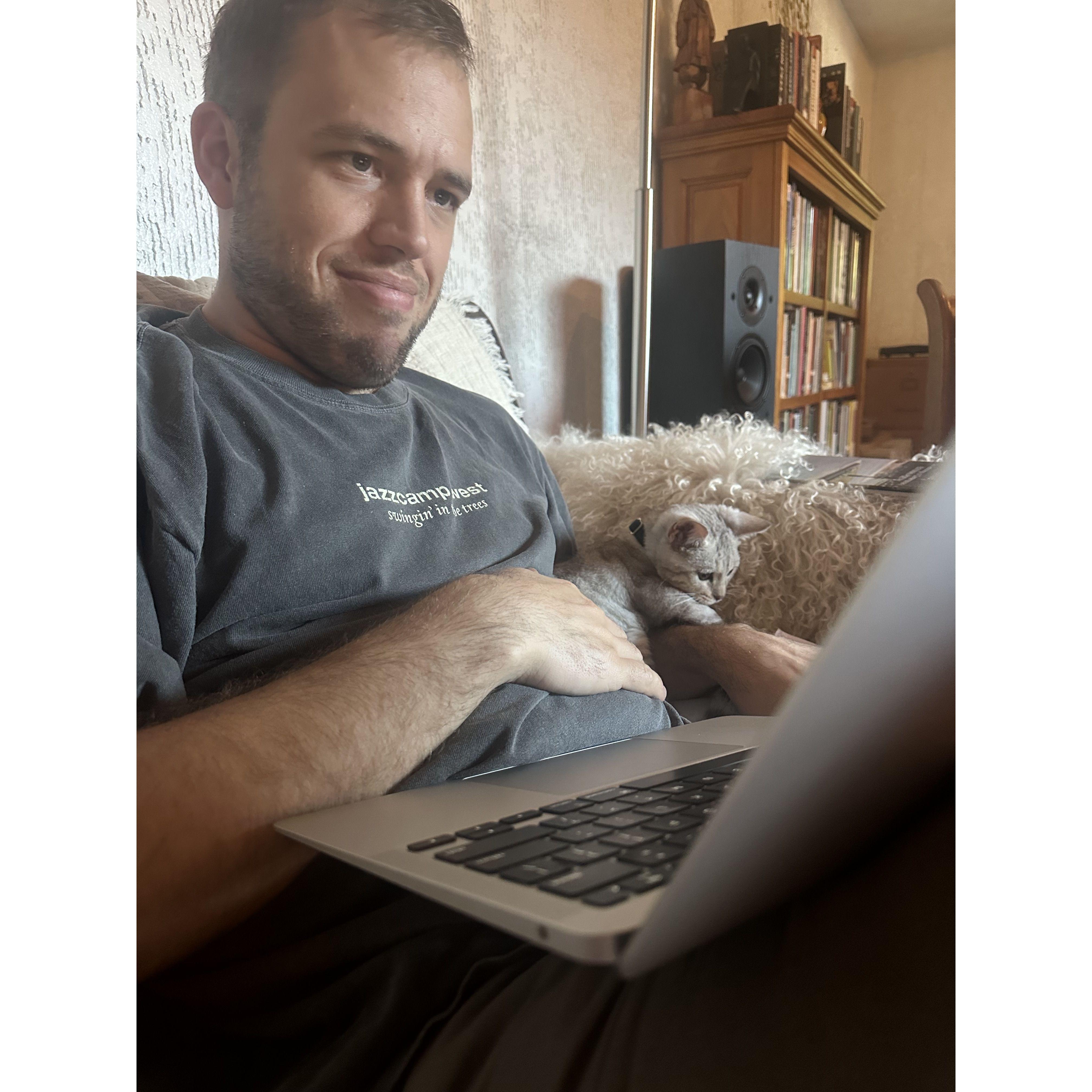 working with his assistant, Mr. Yuki.