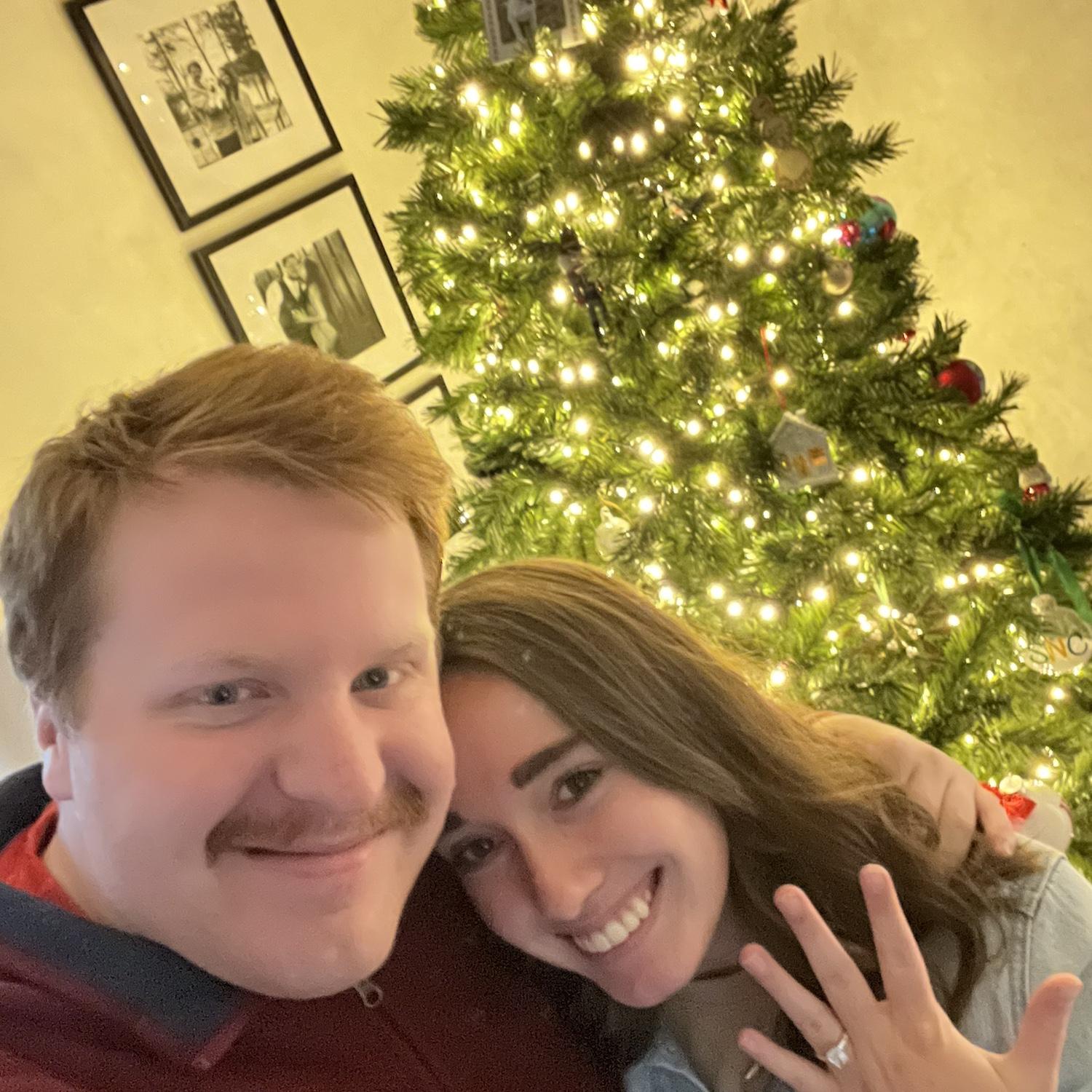 Spencer popped the question right by Lulu’s ornament on our Christmas tree, making the moment even more magical and meaningful. A perfect holiday memory that we'll cherish forever!