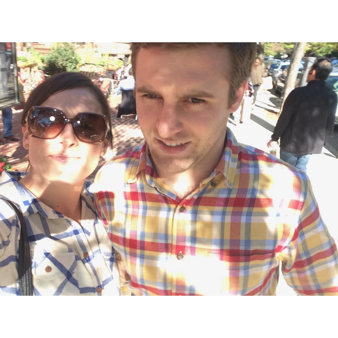 Glad in plaid, Rachel grins next to her knight in shining armor during a visit to Boston in Spring 2015. Here, they're pictured on Newbury Ave - their all-time fav place to shop💸