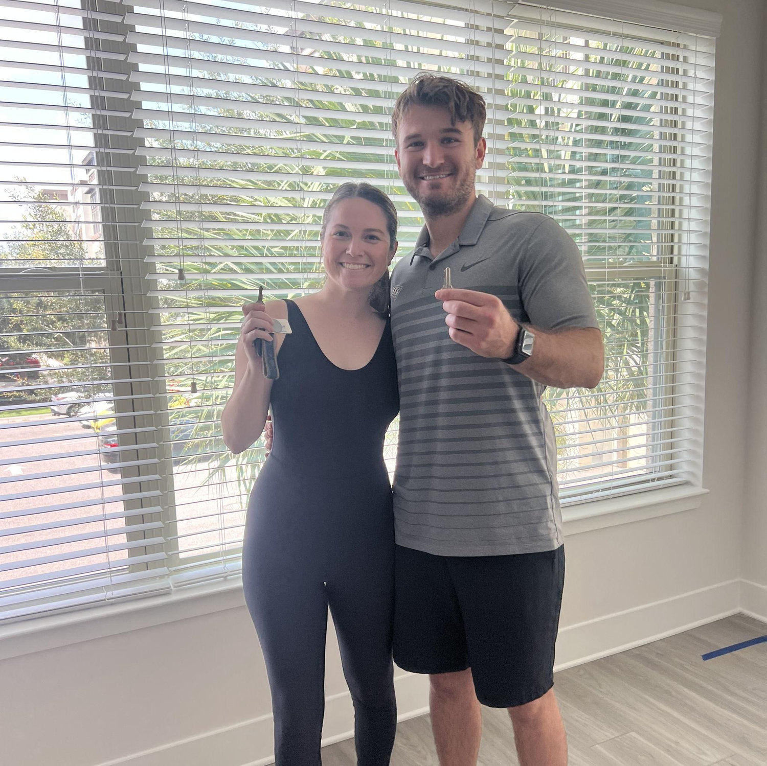 Our first place together! The day we got the keys in August 2023.