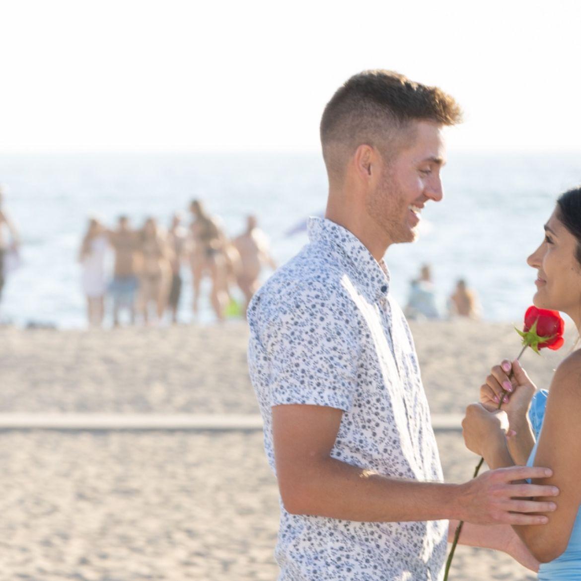 While Logan was proposing, a man broke his leg and got hauled off the beach. He was slowly loaded into an ambulance as we celebrated with our family and drank champagne. Hope he's good now though.