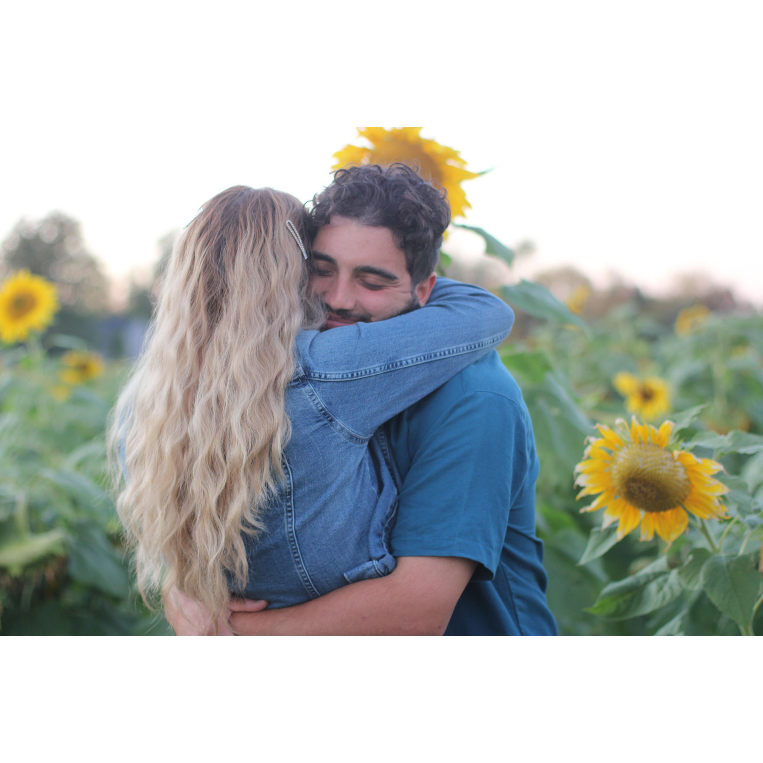 I had always wanted couple photos in a flower field. Sunflowers so happen to be Freddy's favorite flower. So we made it happen just before the sun and the flowers lost their bloom.