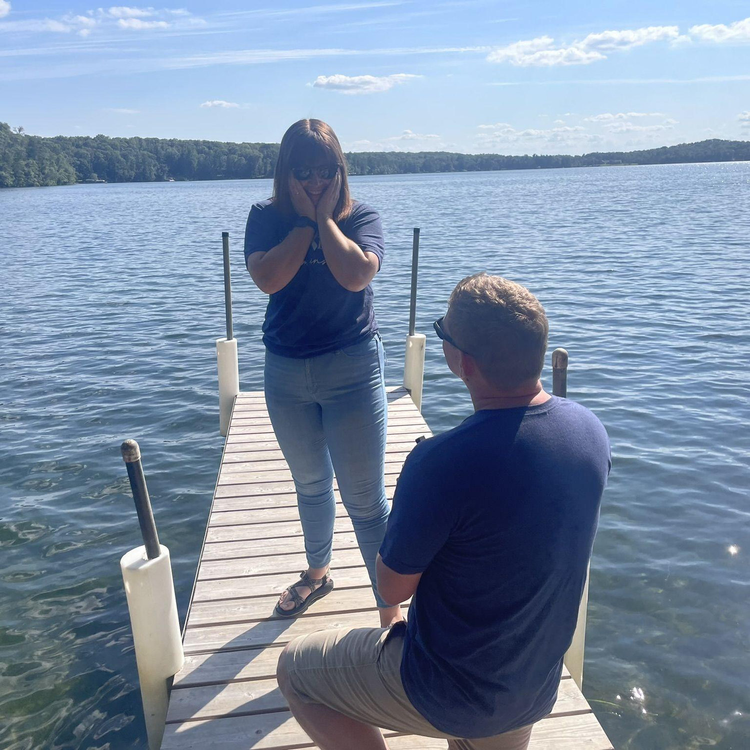 Brian was successfully able to surprise Abby when he proposed on Sylvan Lake in Minnesota at the Kavanaugh Lake Resort. Brian's family has come to this resort for summer vacations since he was a kid.