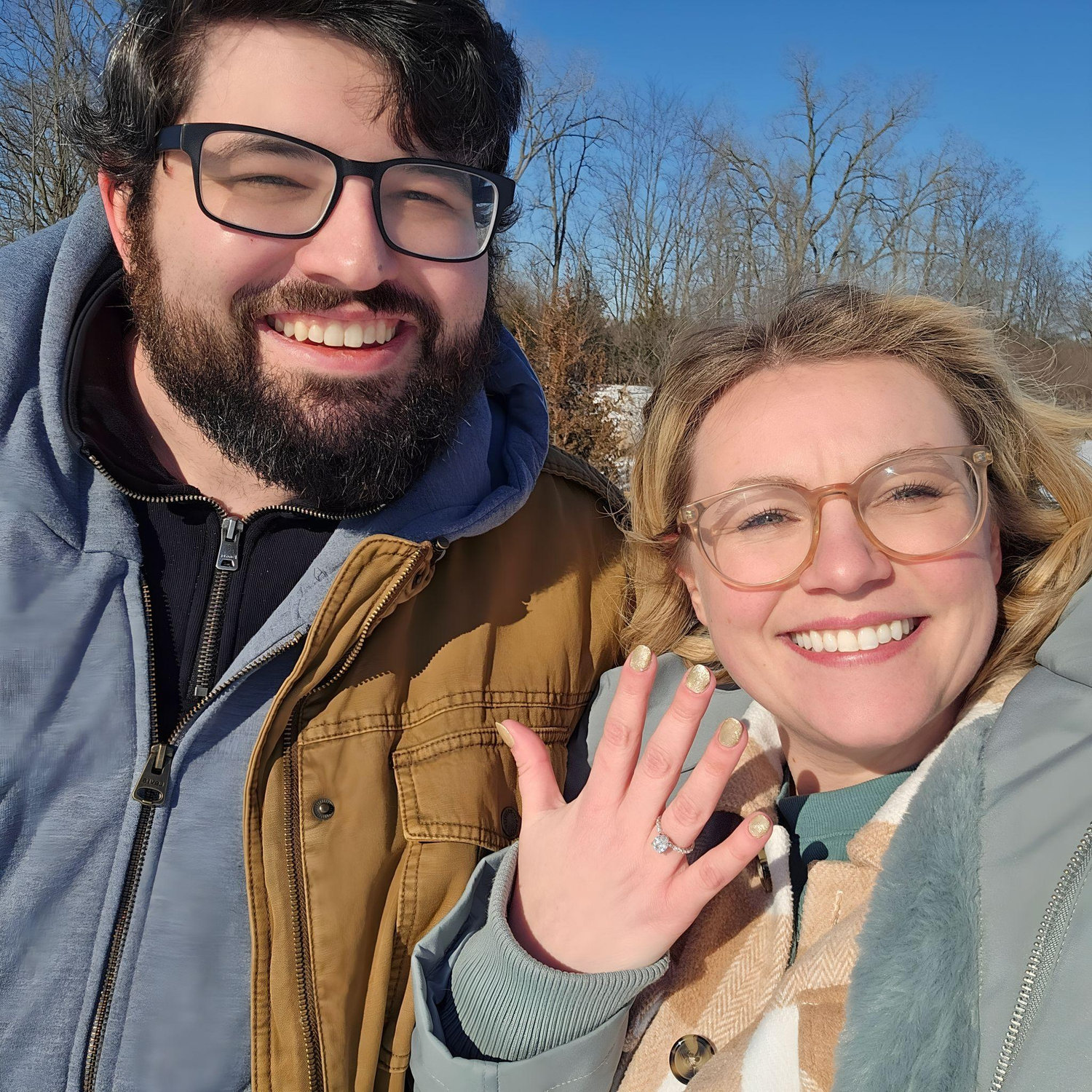 We'll start from the middle of the story: Joe proposed to Lauren on our frigidly cold, five-year anniversary date, 1/25/2025, on a walk in a park near our first home in Michigan.