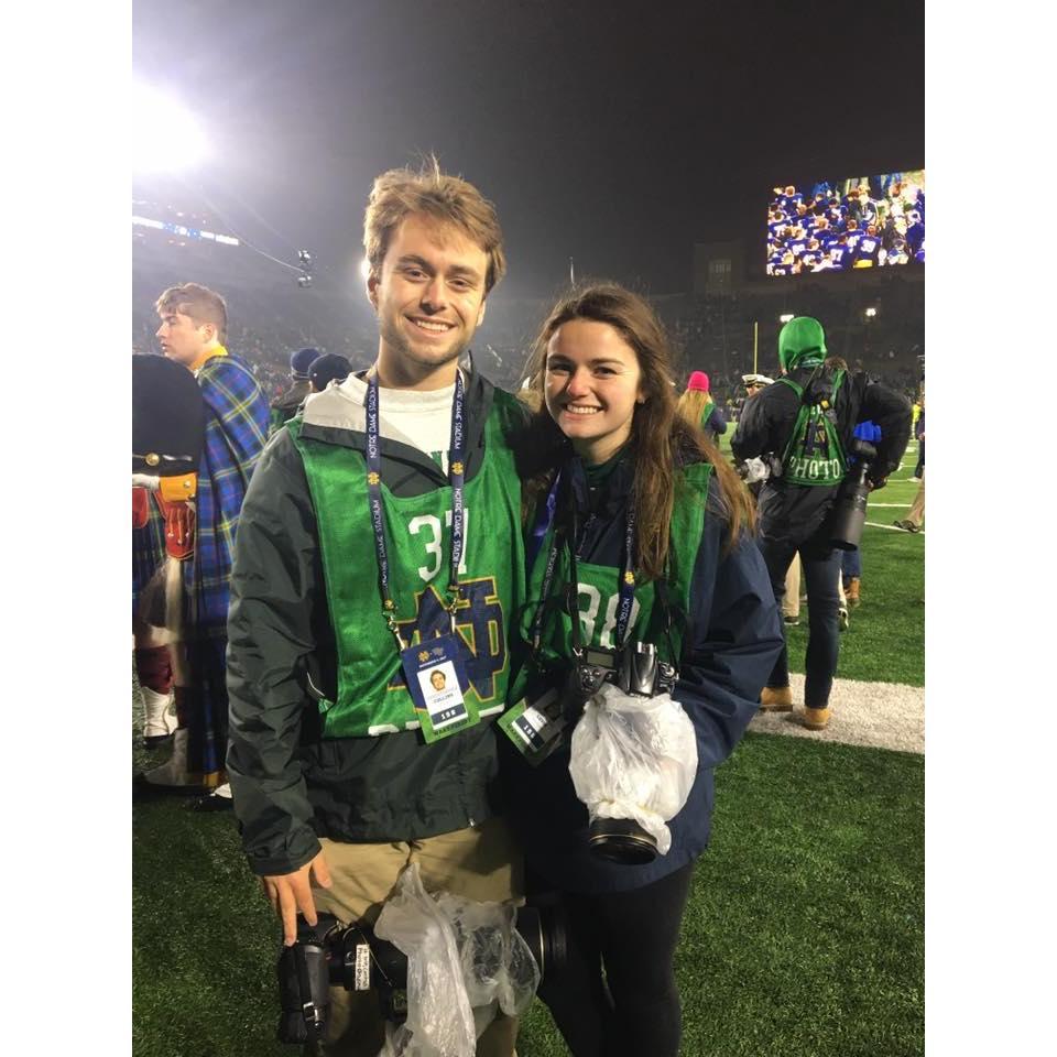 Taking football photos for the student newspaper together