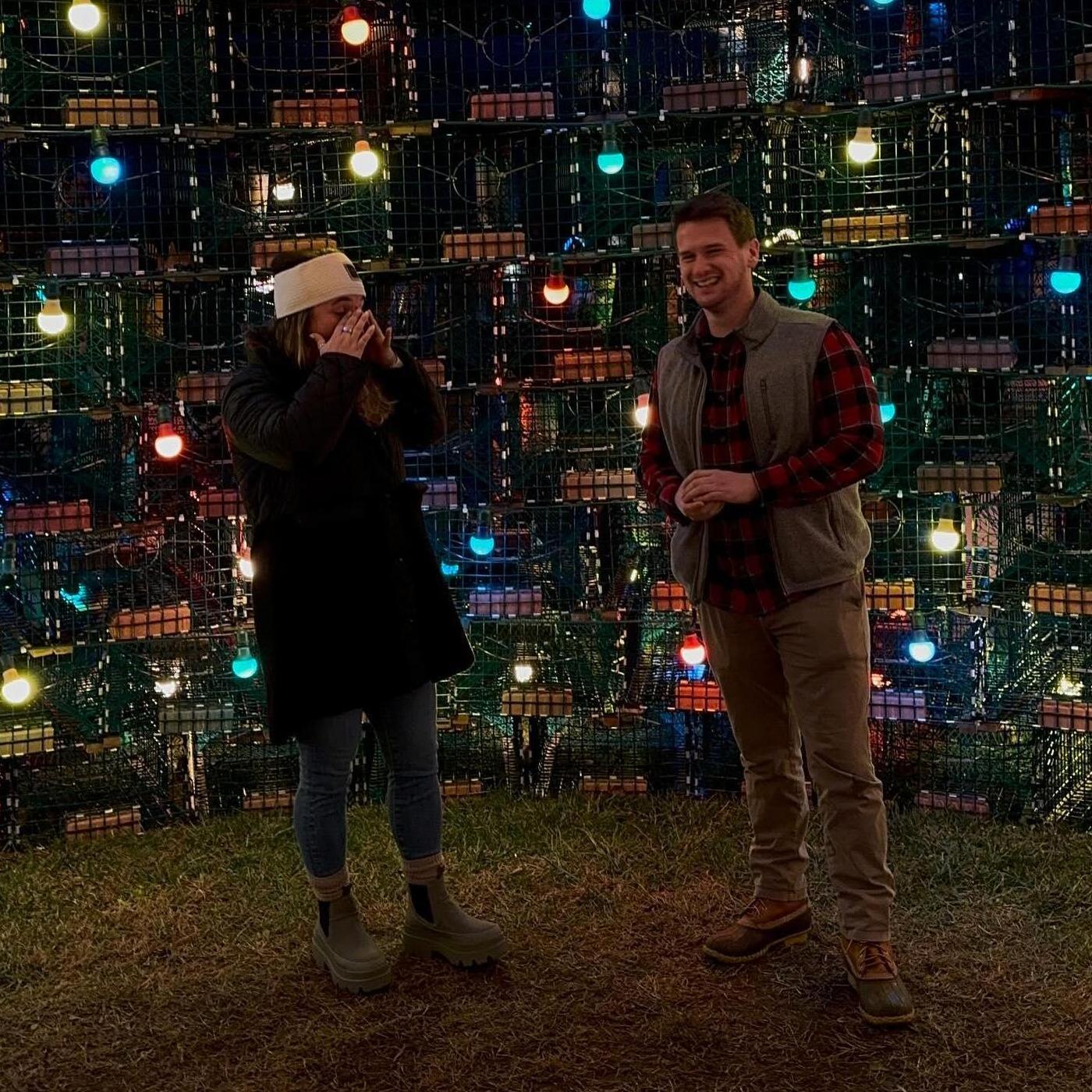 all smiles knowing he nailed the proposal