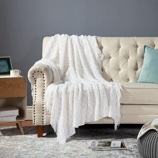 Bedsure 100% Acrylic Knit Throw Blanket, 50×60 Inch - Soft Warm Cozy Lightweight Decorative Blanket with Tassels for Couch, Bed, Sofa, Travel - All Seasons Suitable for Women, Men and Kids (White)