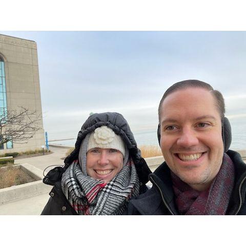 Tom Giving Rebecca a Tour of Loyola's Campus (Lake Michigan in the Background). Rebecca = Freezing Cold. Tom = A Little Chilly (2023)