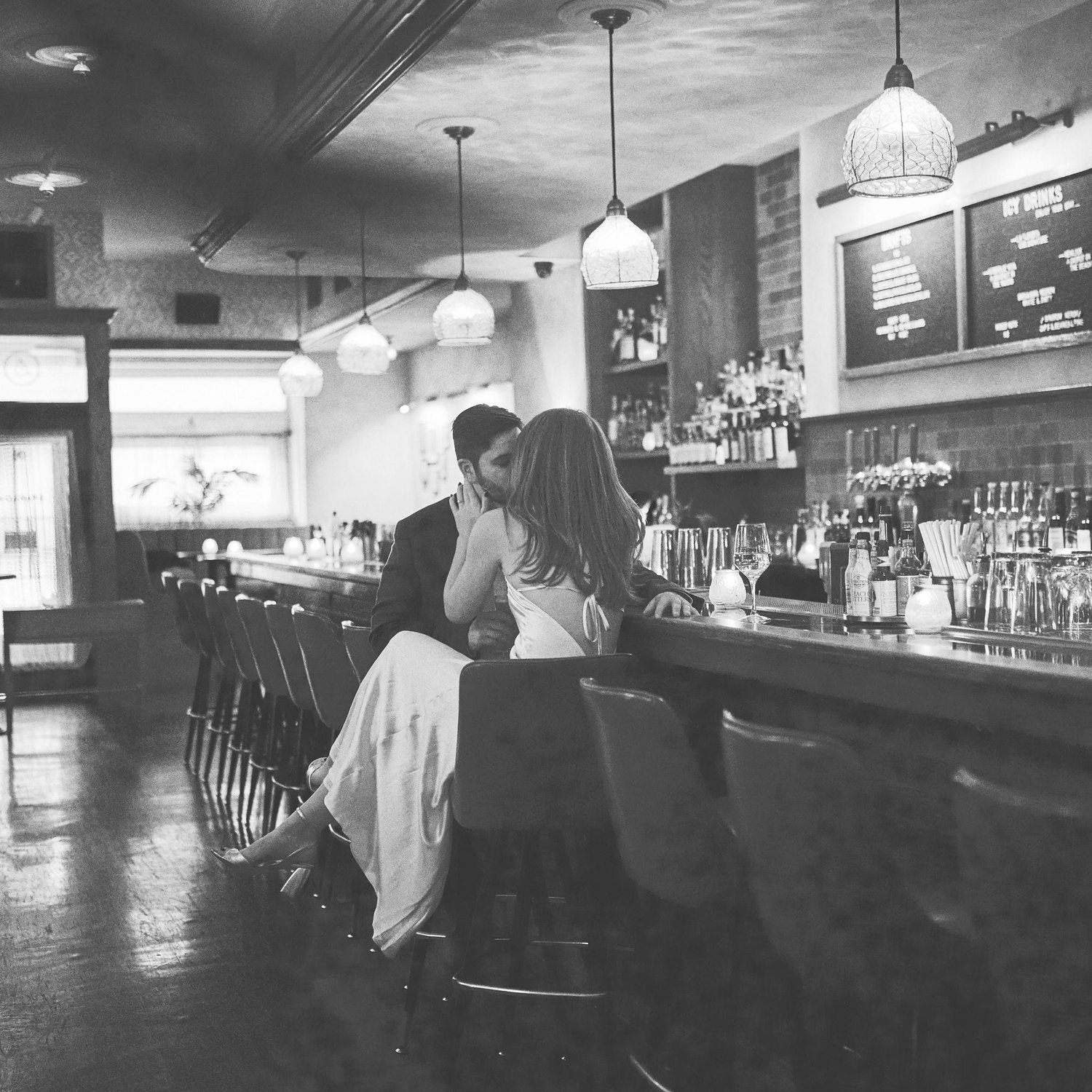 Engagement photos! The bar and seats we had our first date at!