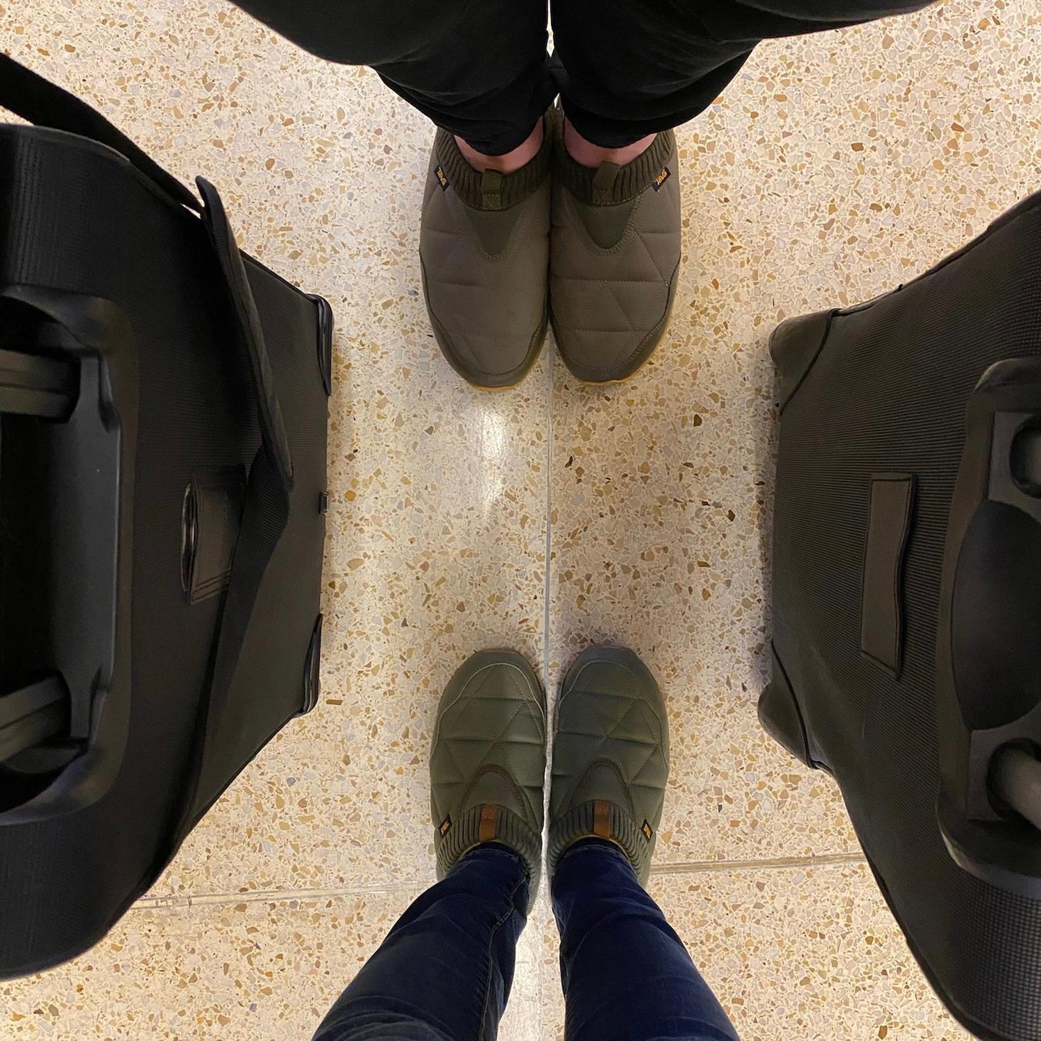 Matching shoes on our first flight together in February 2020! On our way to meet Jen's sister in San Diego.