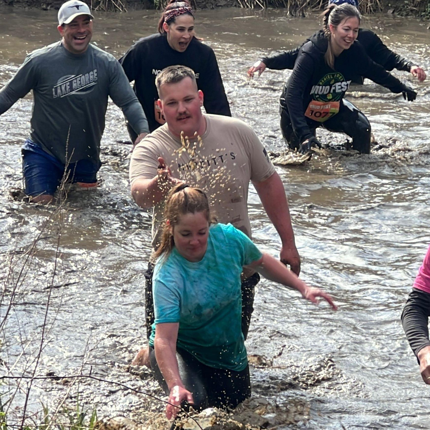 Sarah convinced Mark to participate in a 5K Mudfest!
