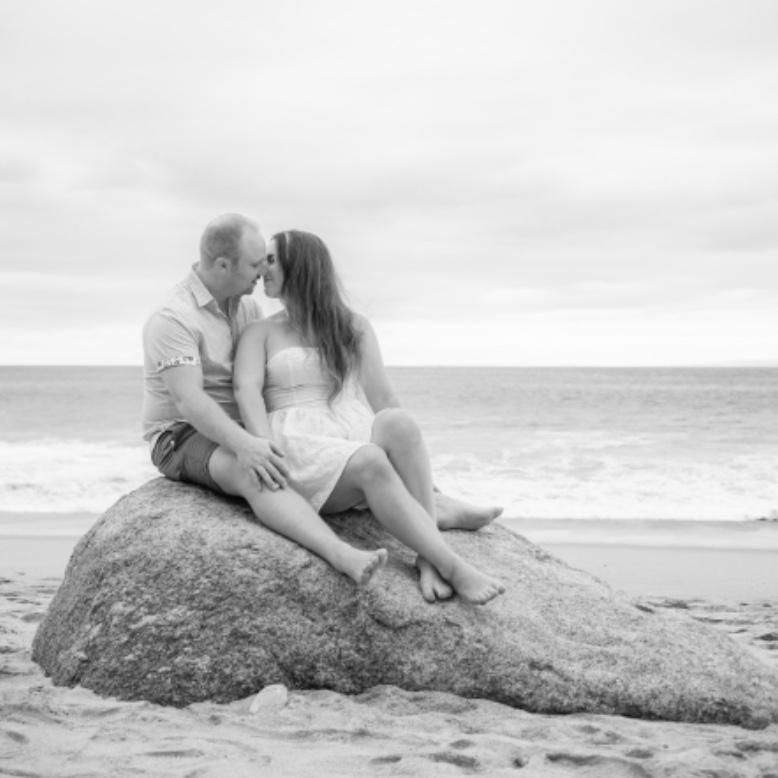 On our Last Trip to Mexico We took engagement photos. We're not "Photo takers" so the photographer had his work cut out for him but this one turned out really cute.